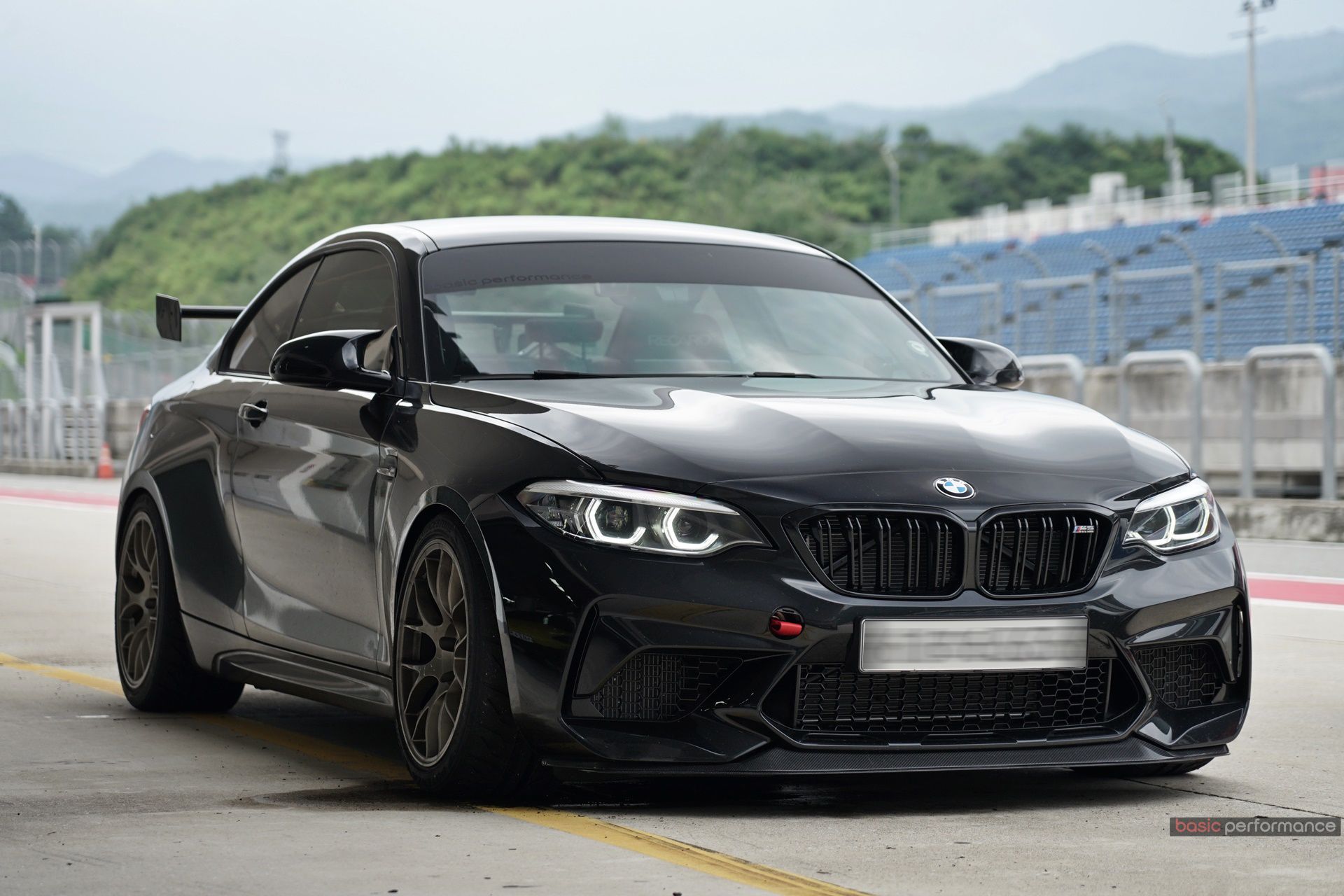 Black BMW F87 M2 with 18" EC-7 Apex wheels in Custom Finish