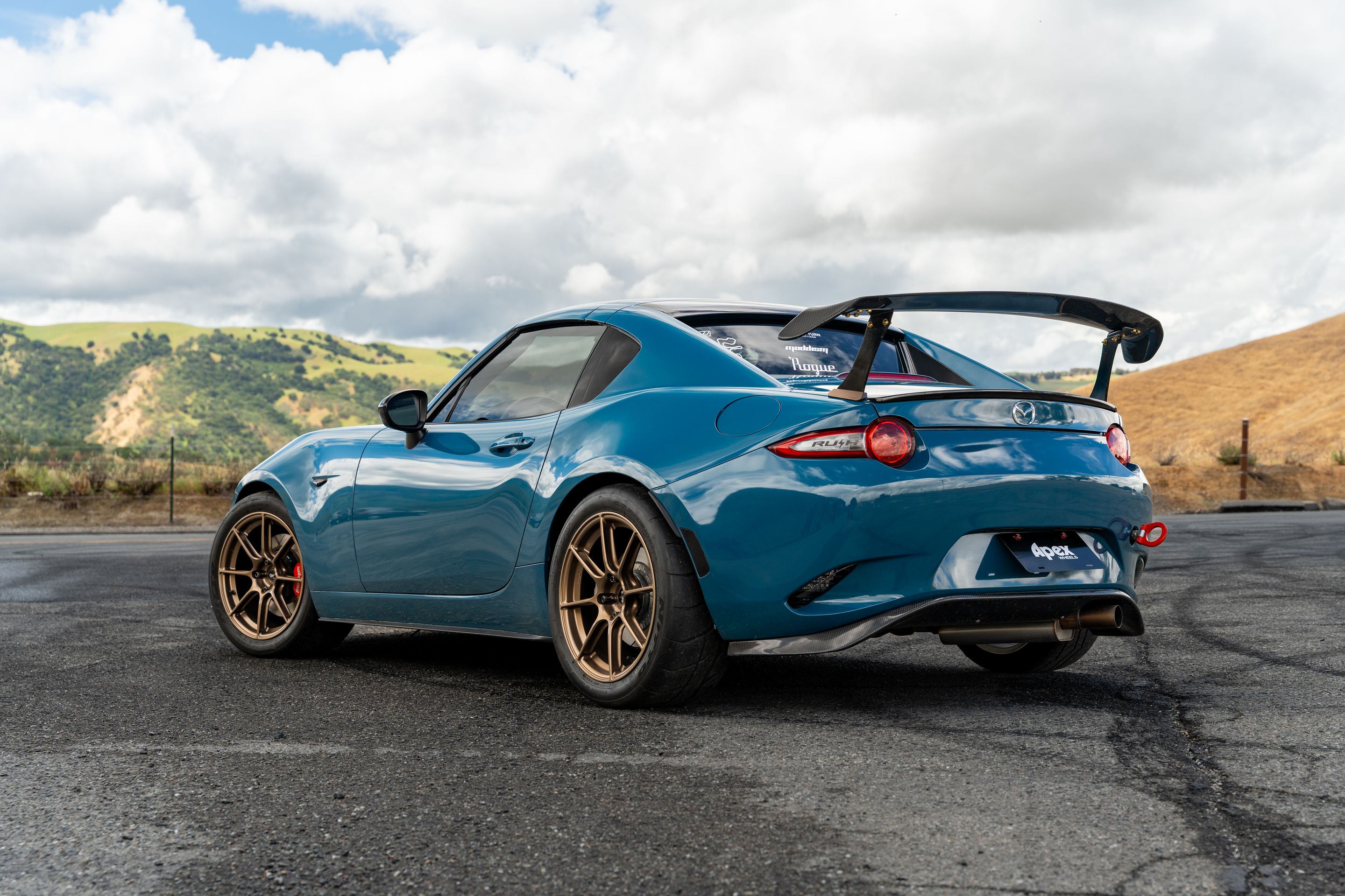 Blue Mazda ND MX-5 Miata with 17" SM-8RS Apex wheels in Satin Bronze