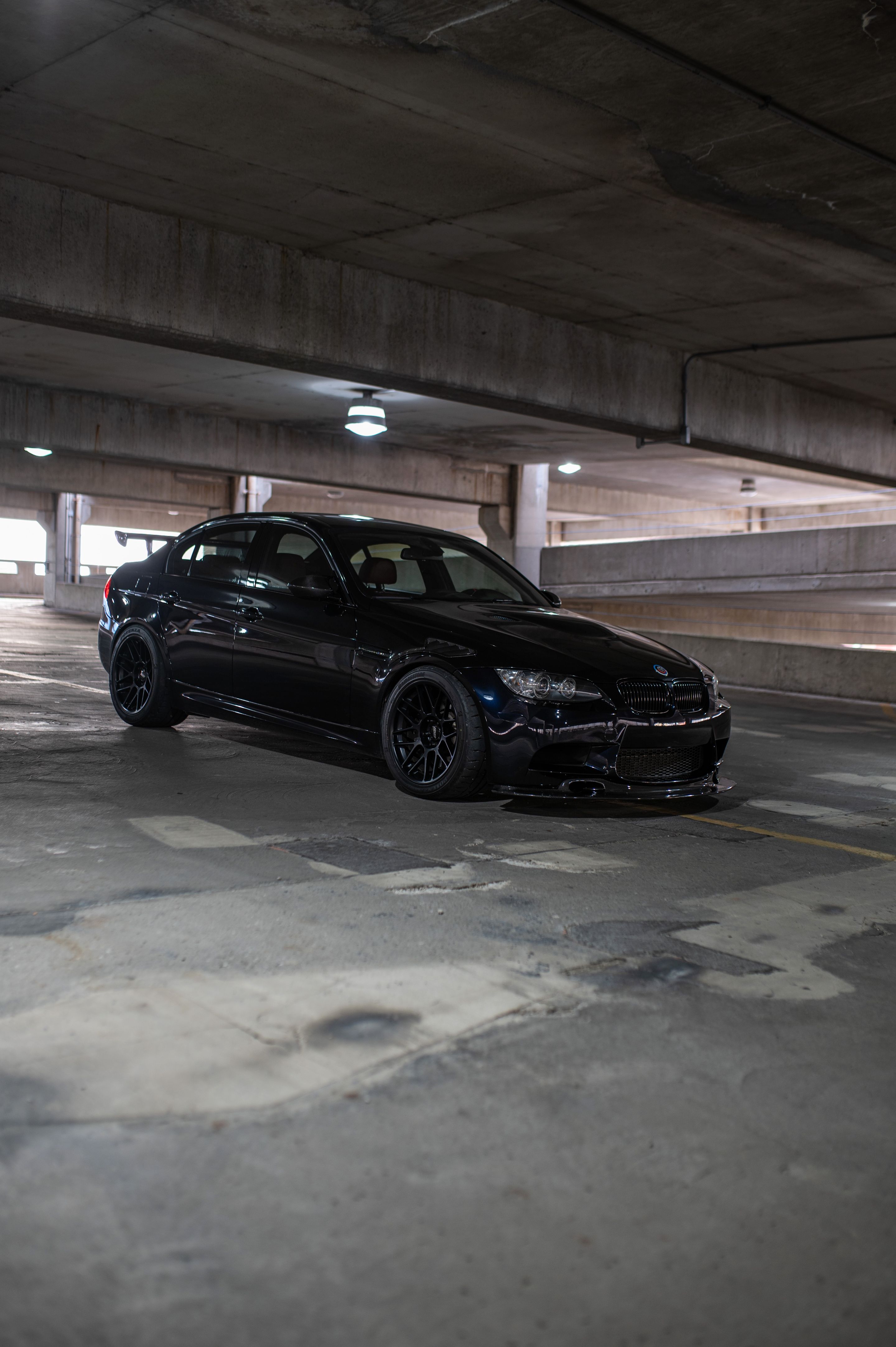 Black BMW E90 Sedan M3 with 18" ARC-8 Apex wheels in Satin Black