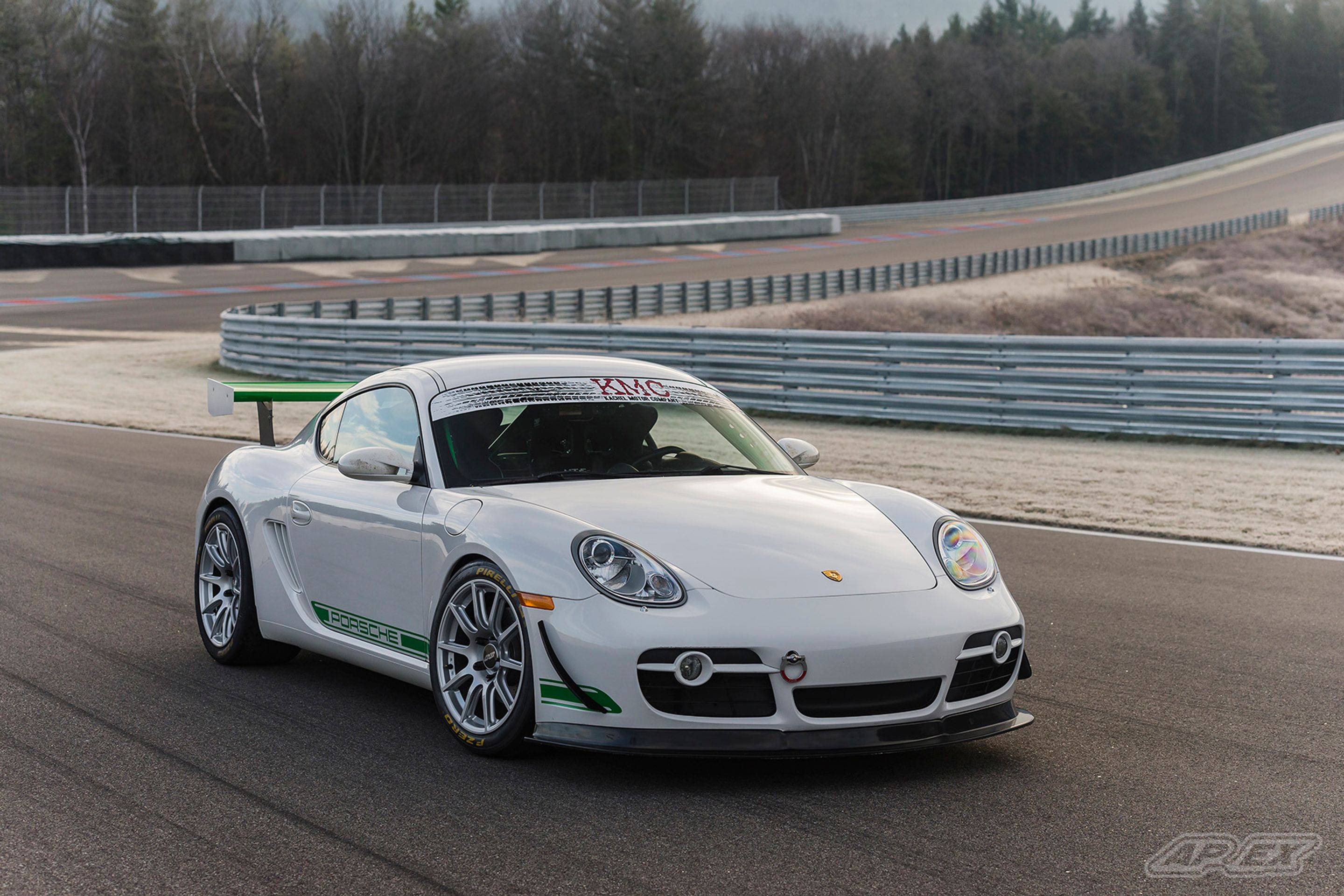 White Porsche 987 Cayman S with 18" SM-10 Apex wheels in Race Silver