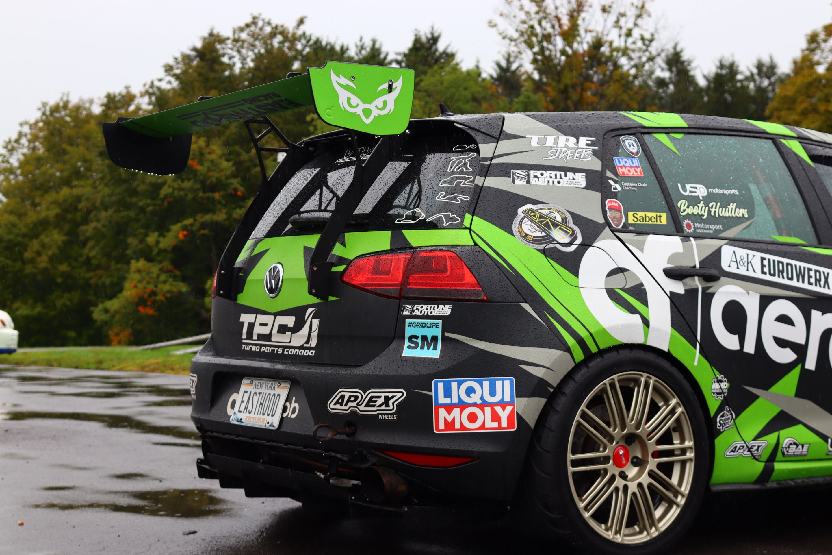 Race Livery VW MK7 GTI with 18" TC-10RT Apex wheels in Motorsport Gold