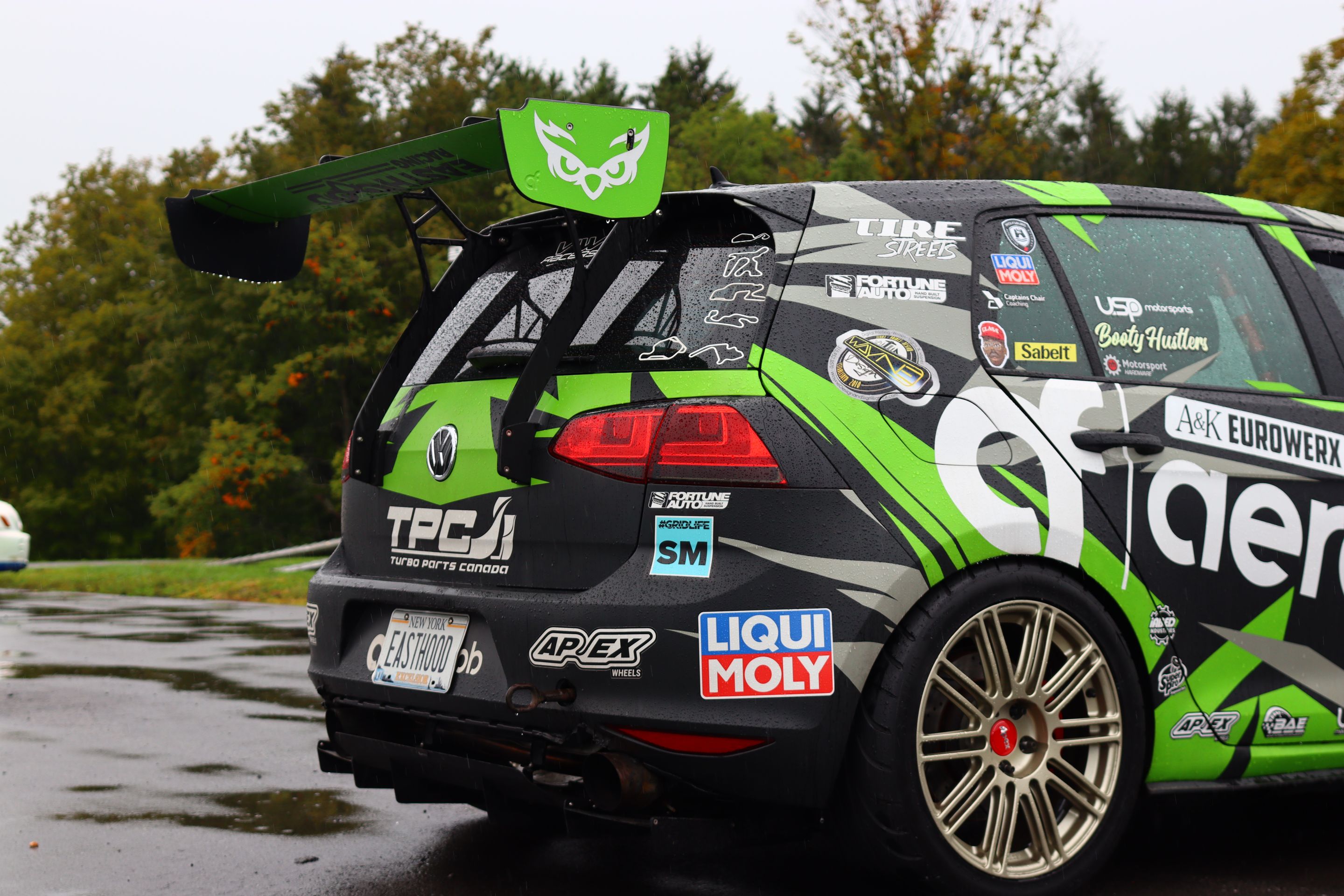 Race Livery VW MK7 GTI with 18" TC-10RT Apex wheels in Motorsport Gold