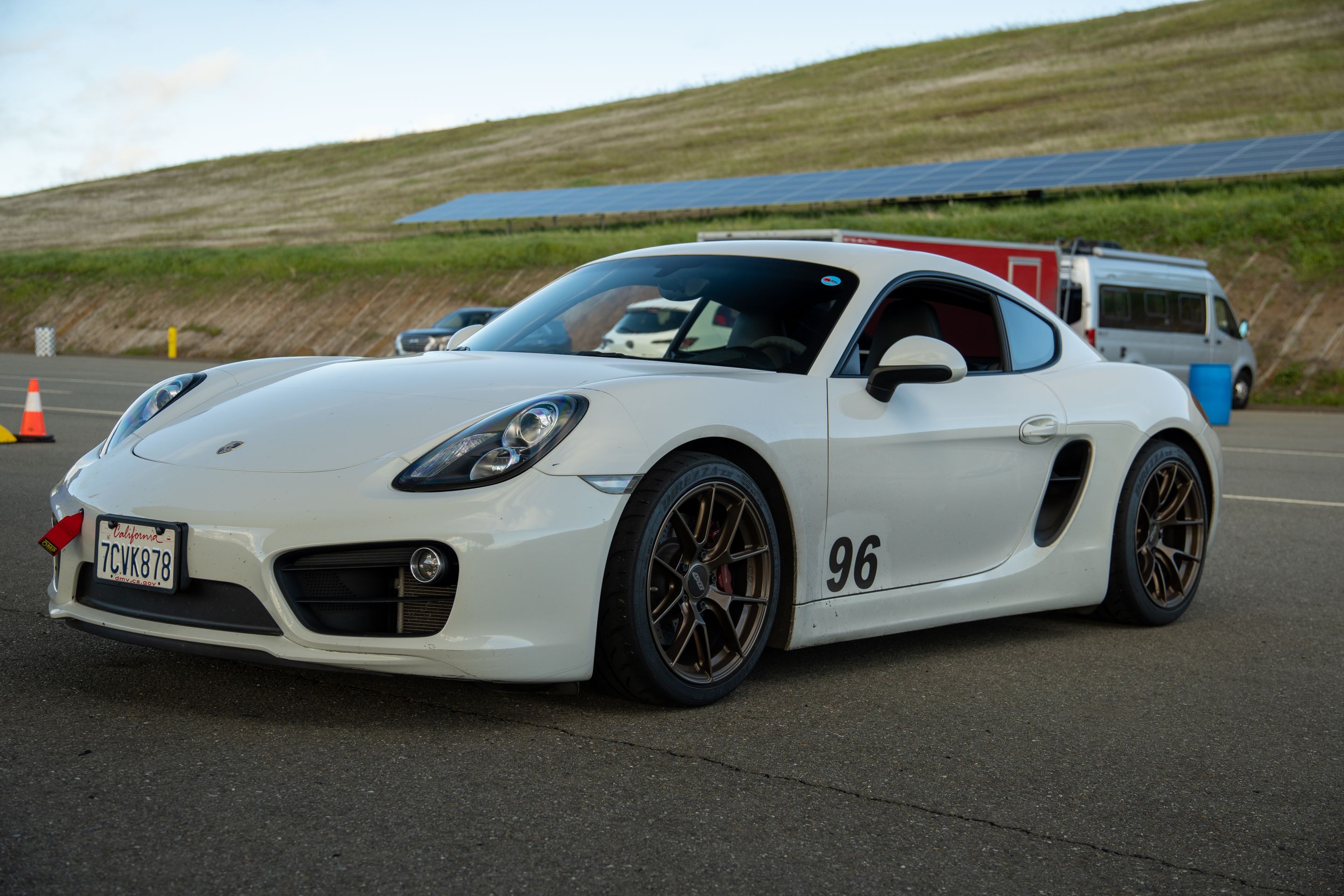 White Porsche 981 Cayman S with 18" VS-5RS Apex wheels in Satin Bronze