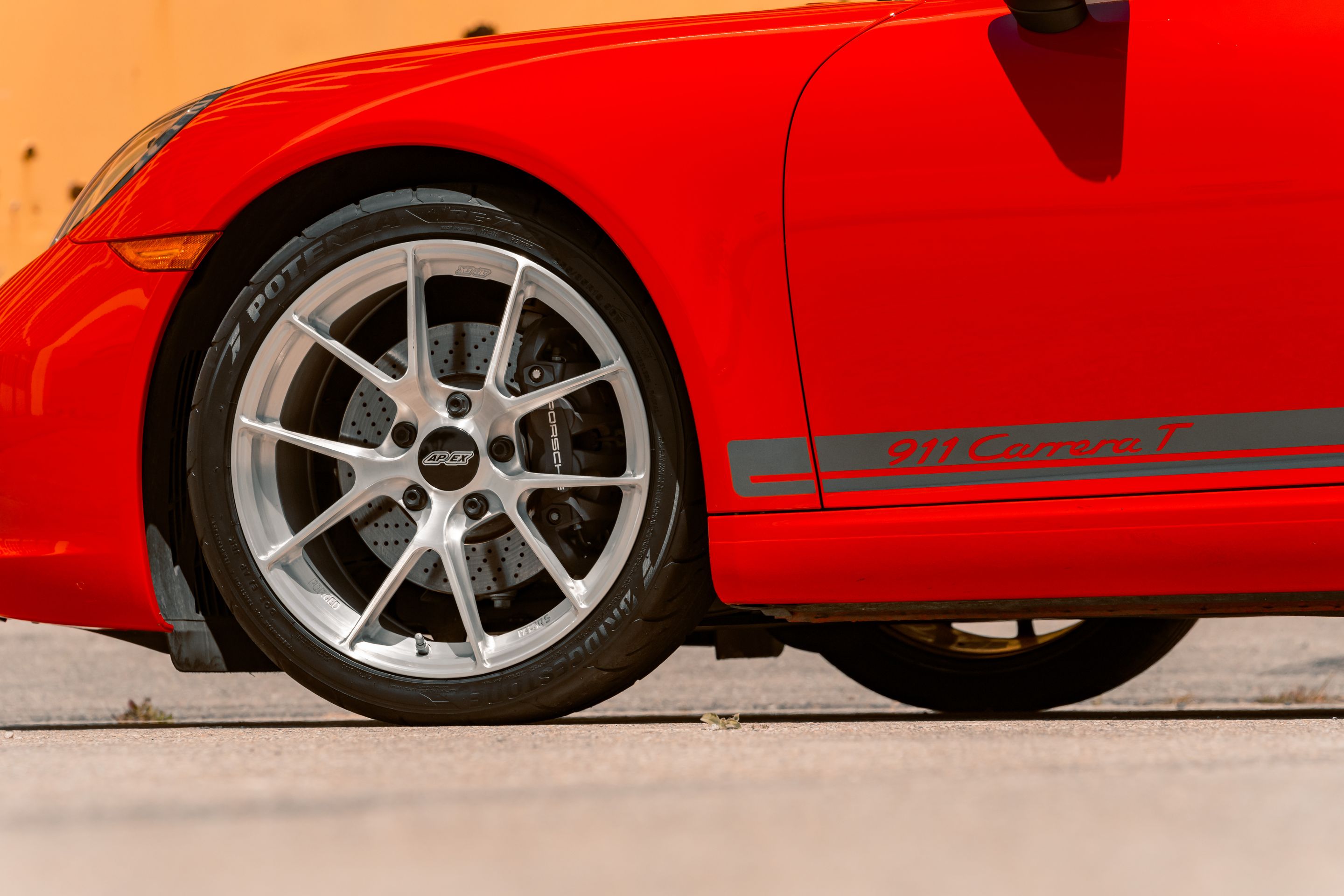 Red Porsche 911 991.2 Carrera T with 19" VS-5RS Apex wheels in Brushed Clear