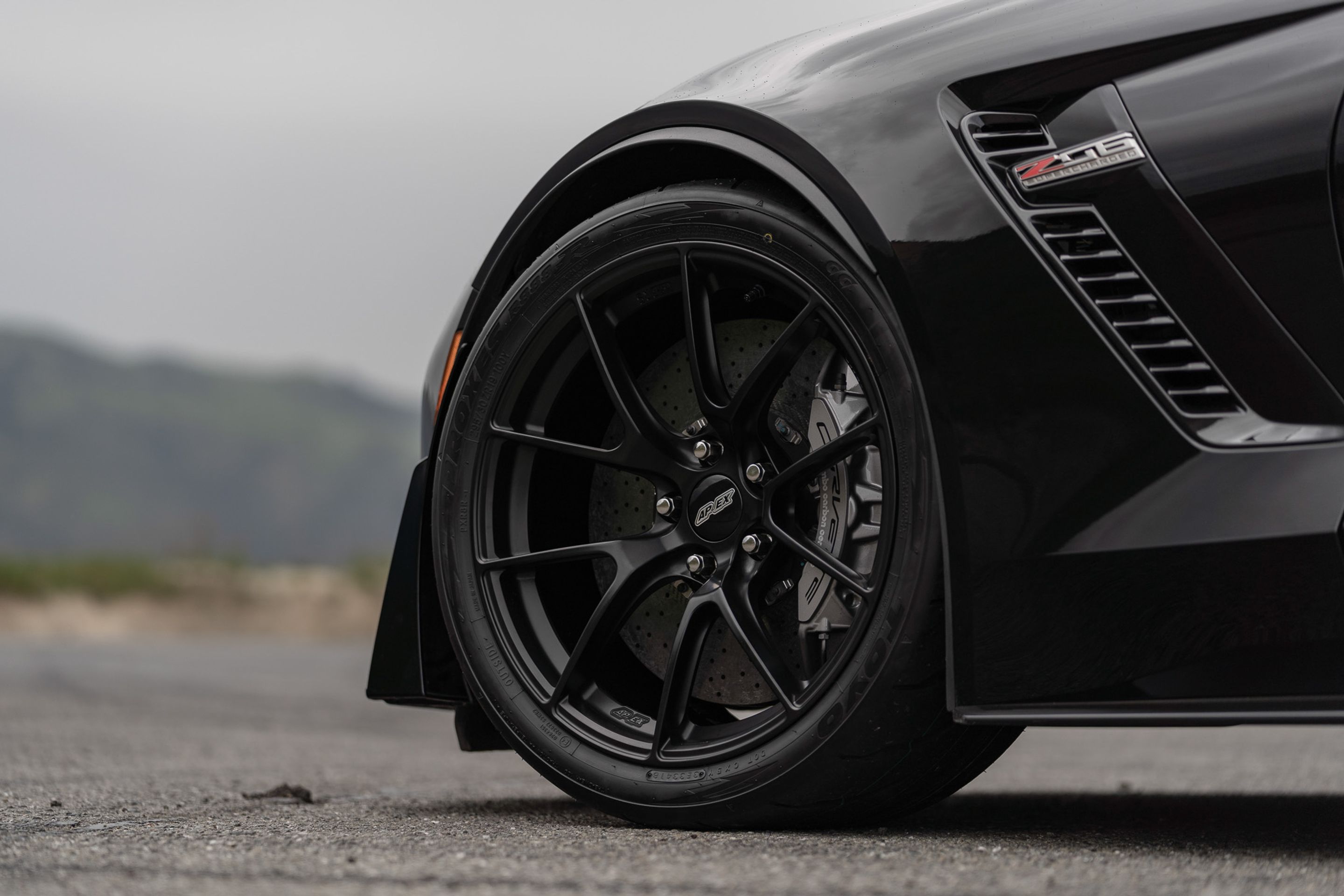 Black Chevrolet C7 Corvette Z06 with 19" VS-5RS Apex wheels in Satin Black