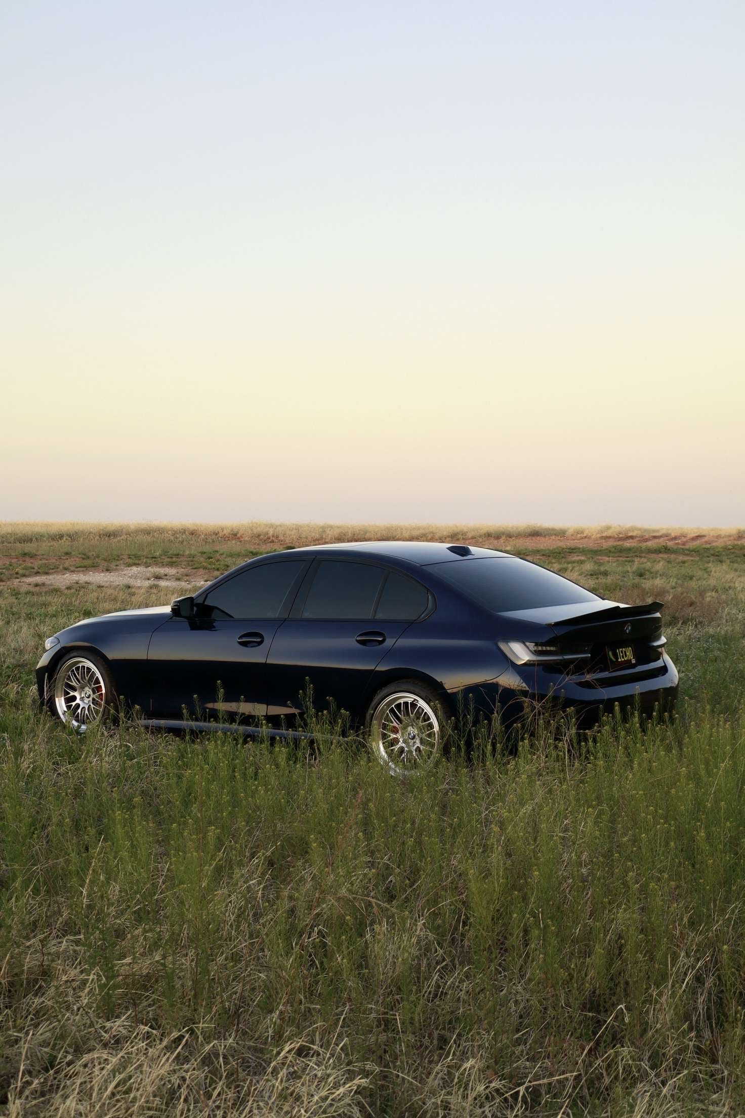 Black BMW G20 Sedan 3 Series with 19" ML-10RT Apex wheels in Machined Lip Race Silver