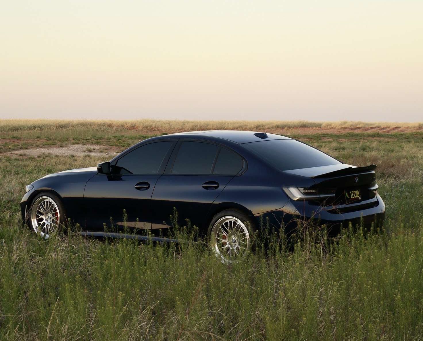 Black BMW G20 Sedan 3 Series with 19" ML-10RT Apex wheels in Machined Lip Race Silver