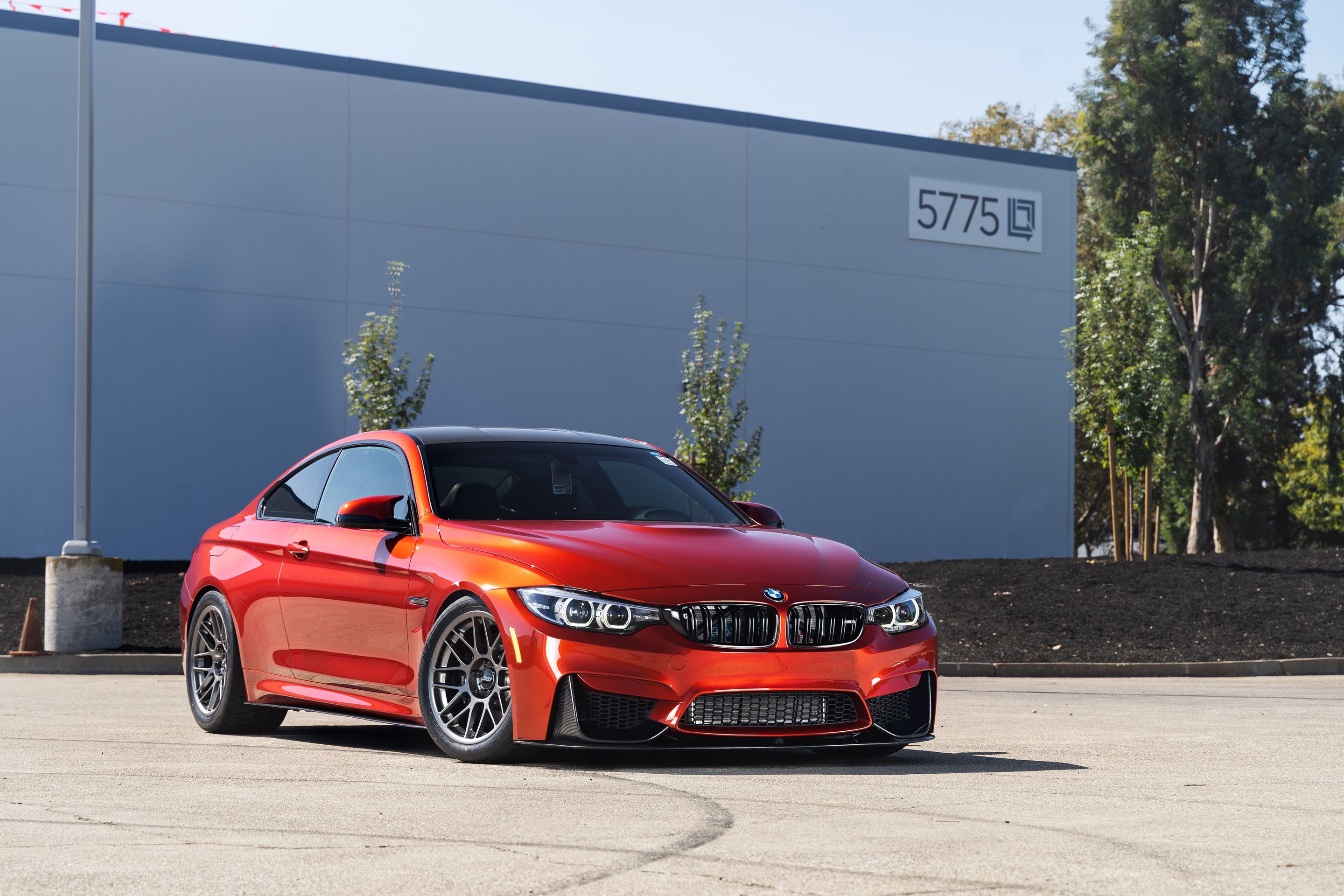 Orange BMW F82 Coupe M4 with 18" ARC-8 Apex wheels in Anthracite