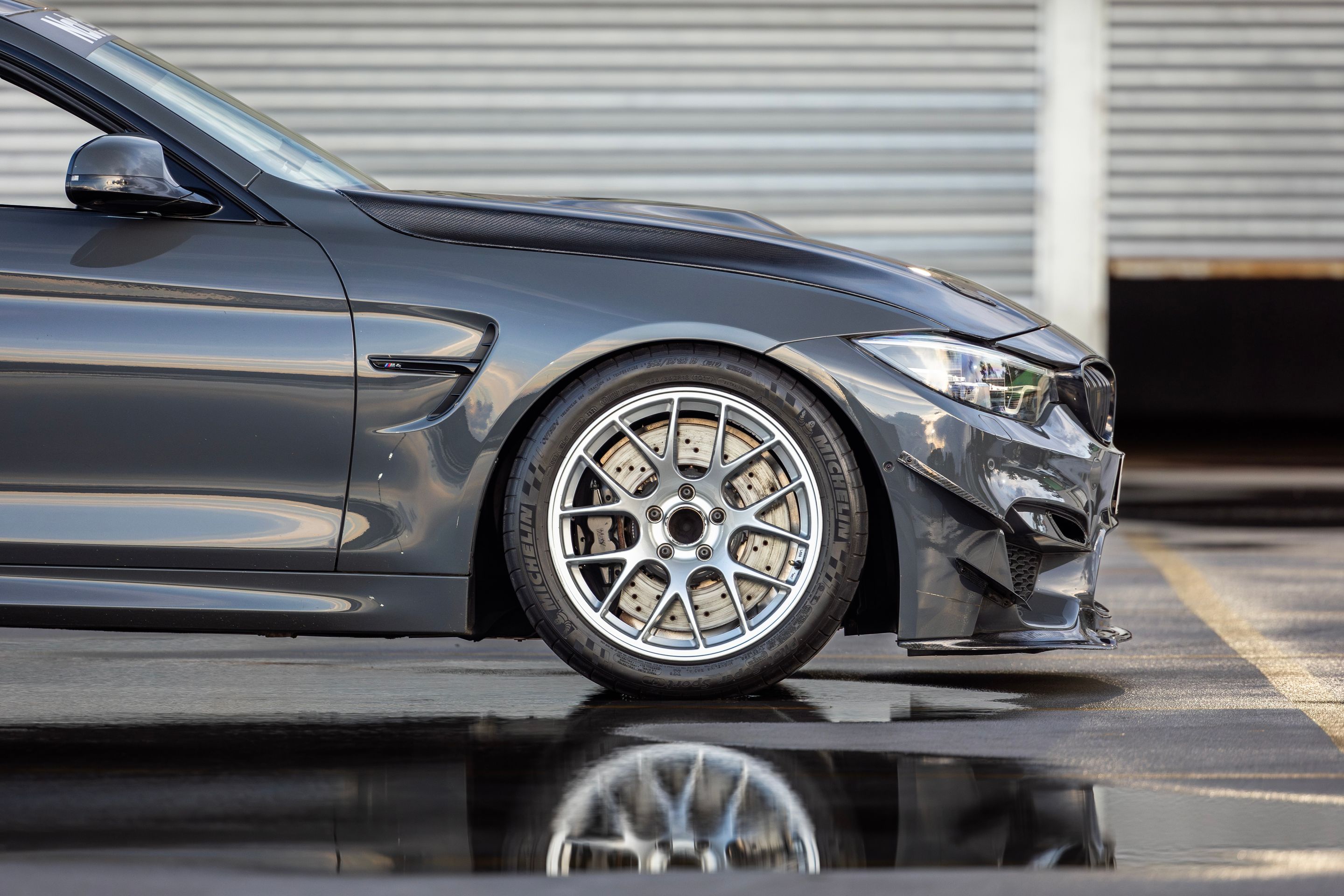 Grey BMW F82 Coupe M4 with 18" EC-7 Apex wheels in Race Silver