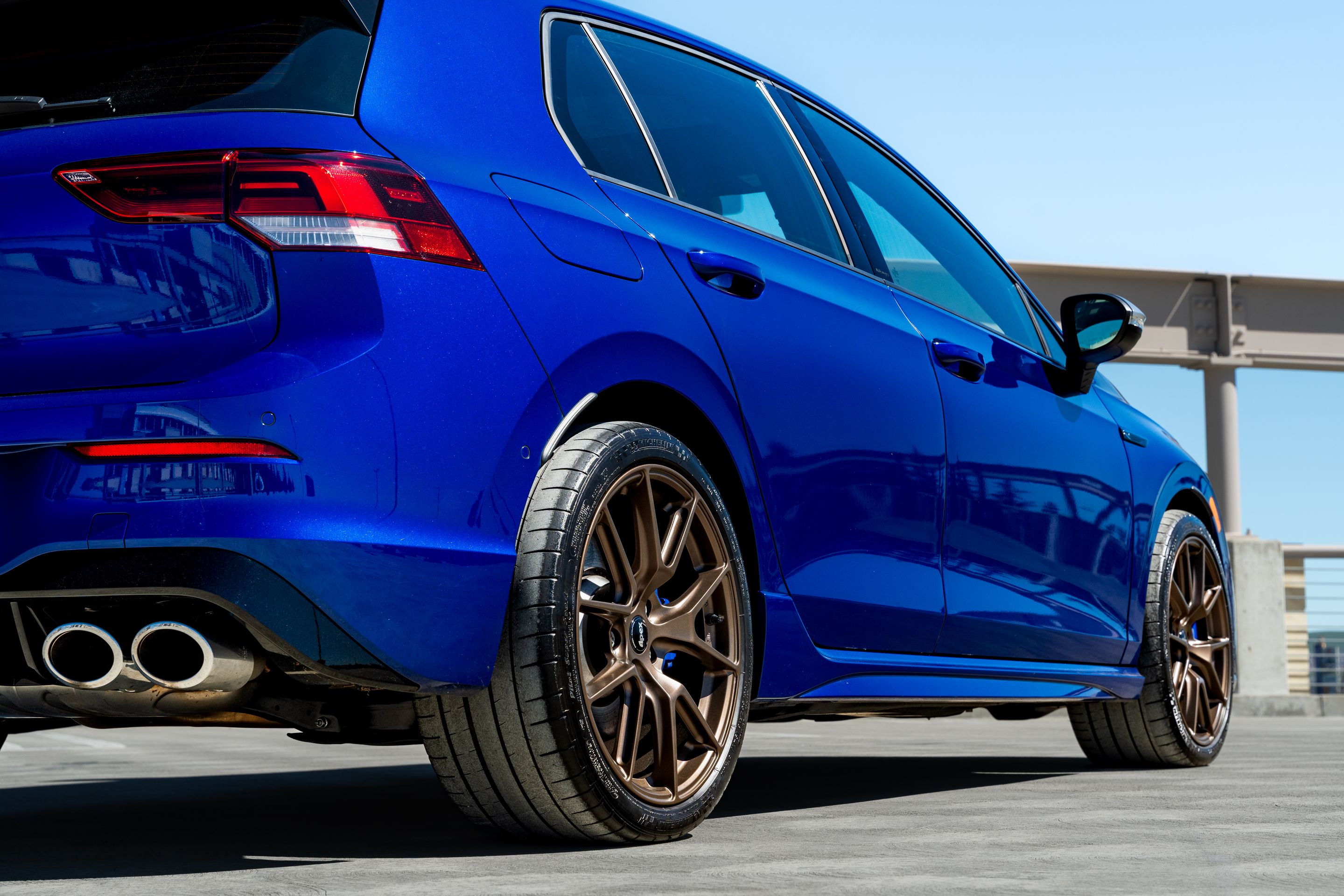 Blue VW MK8 Golf R with 18" VS-5 Apex wheels in Satin Bronze