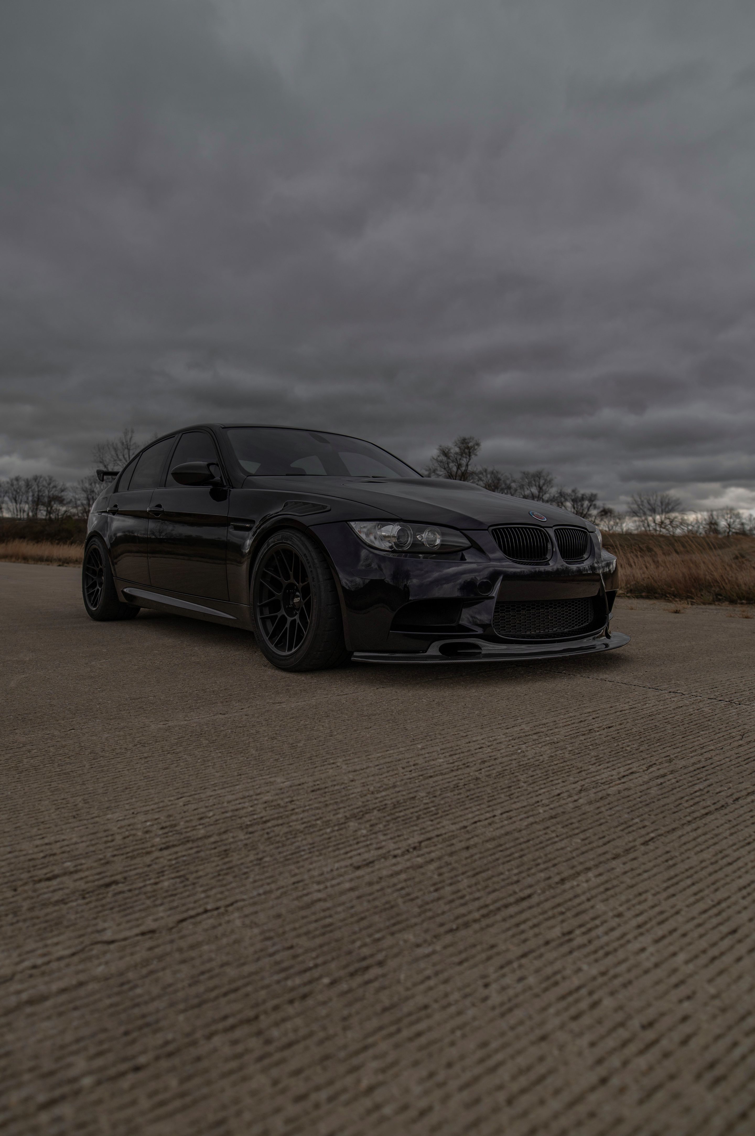 Black BMW E90 Sedan M3 with 18" ARC-8 Apex wheels in Satin Black