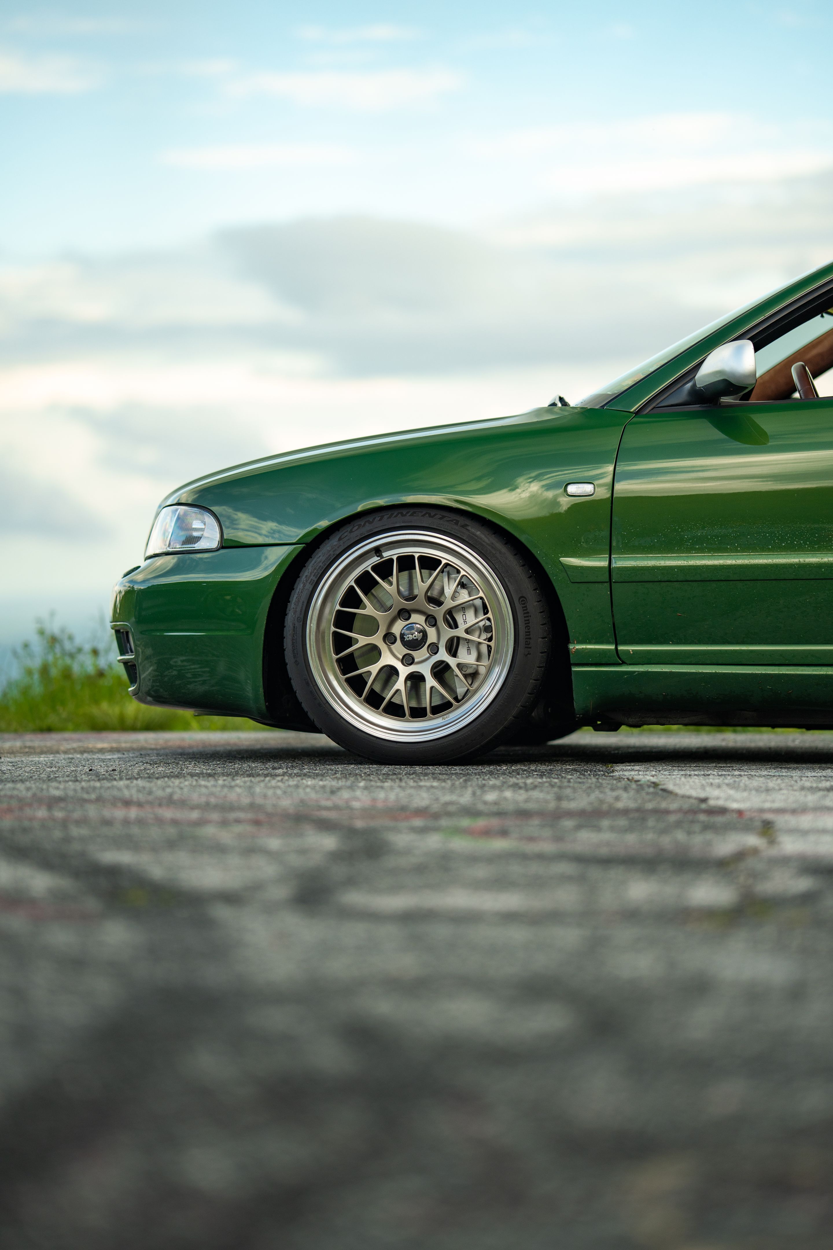 Green Audi B5 S4 Avant/Wagon with 18" ML-10RT Apex wheels in Machined Lip Gloss Motorsport Gold