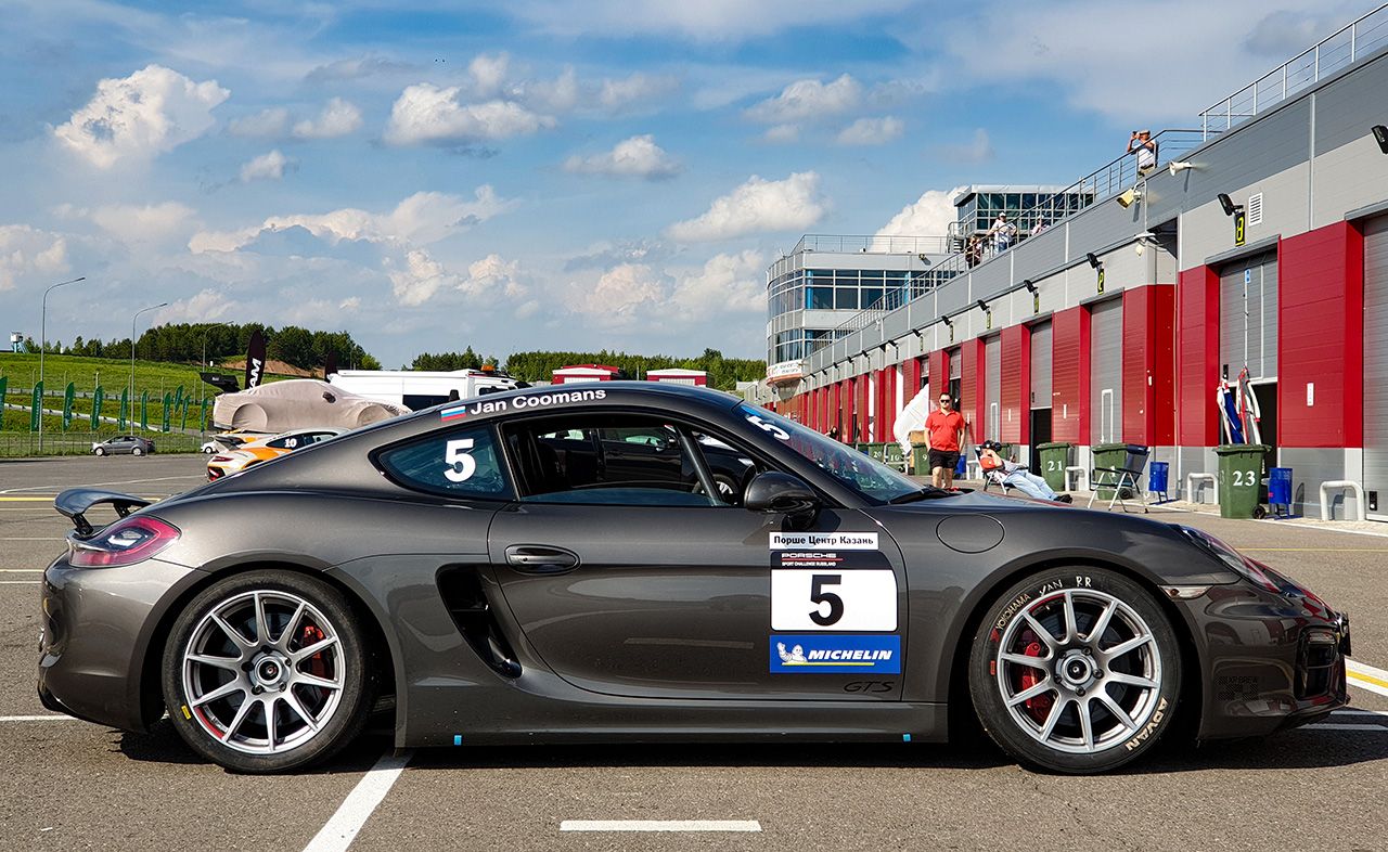 Grey Porsche 981 Cayman GTS with 18" SM-10 Apex wheels in Race Silver