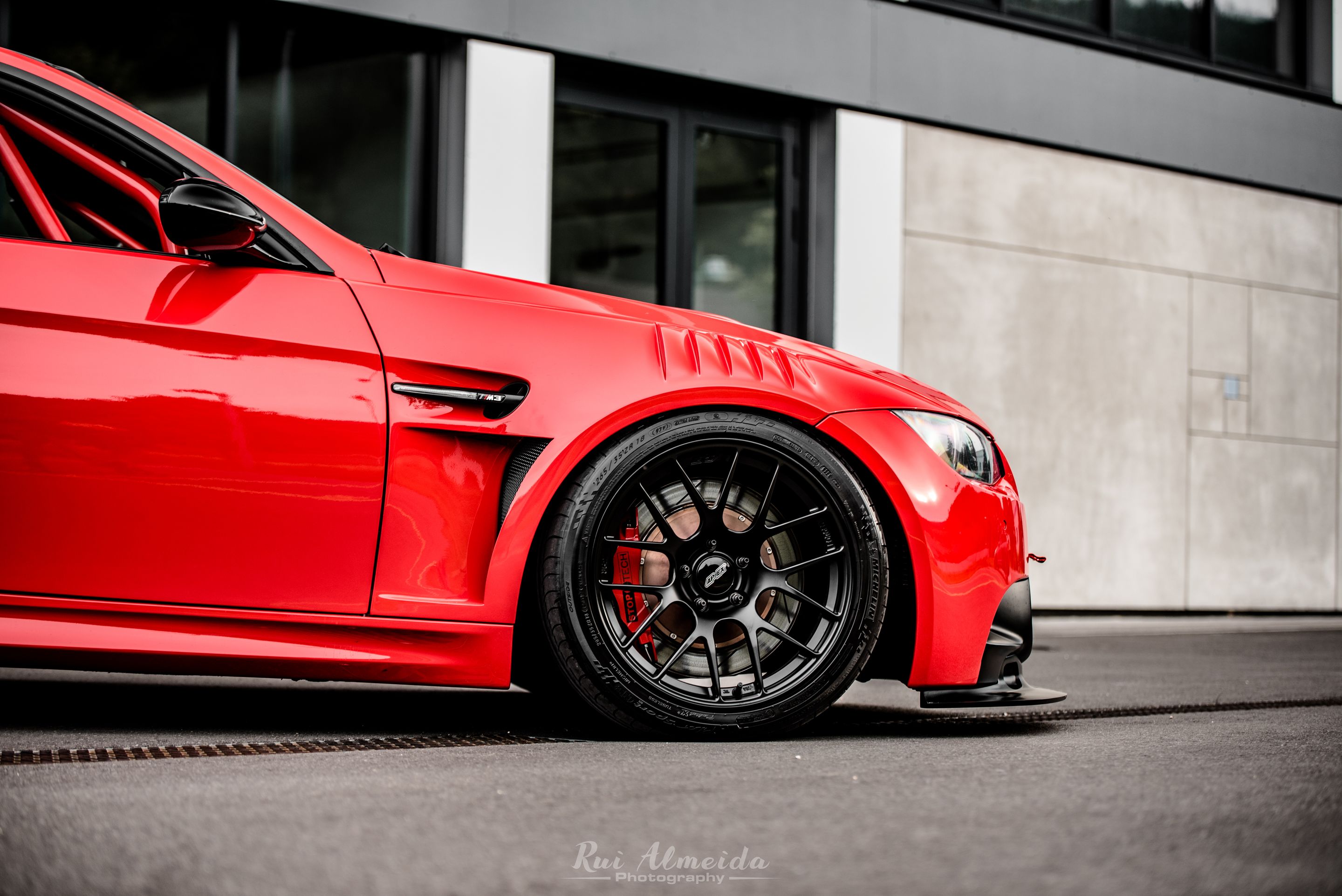 Red BMW E92 Coupe M3 with 18" EC-7R Apex wheels in Satin Black