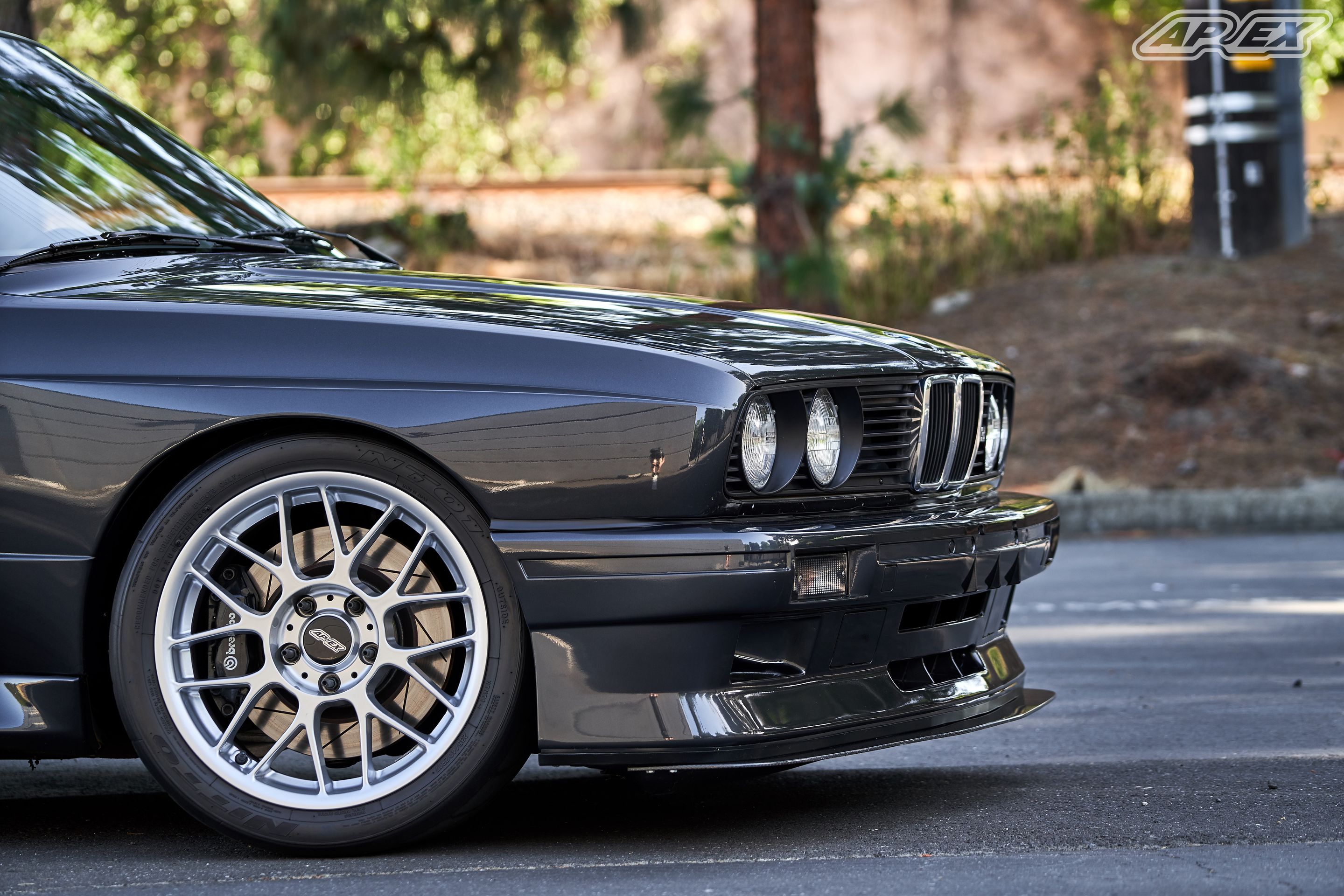 Black BMW E30 M3 with 17" ARC-8 Apex wheels in Hyper Silver