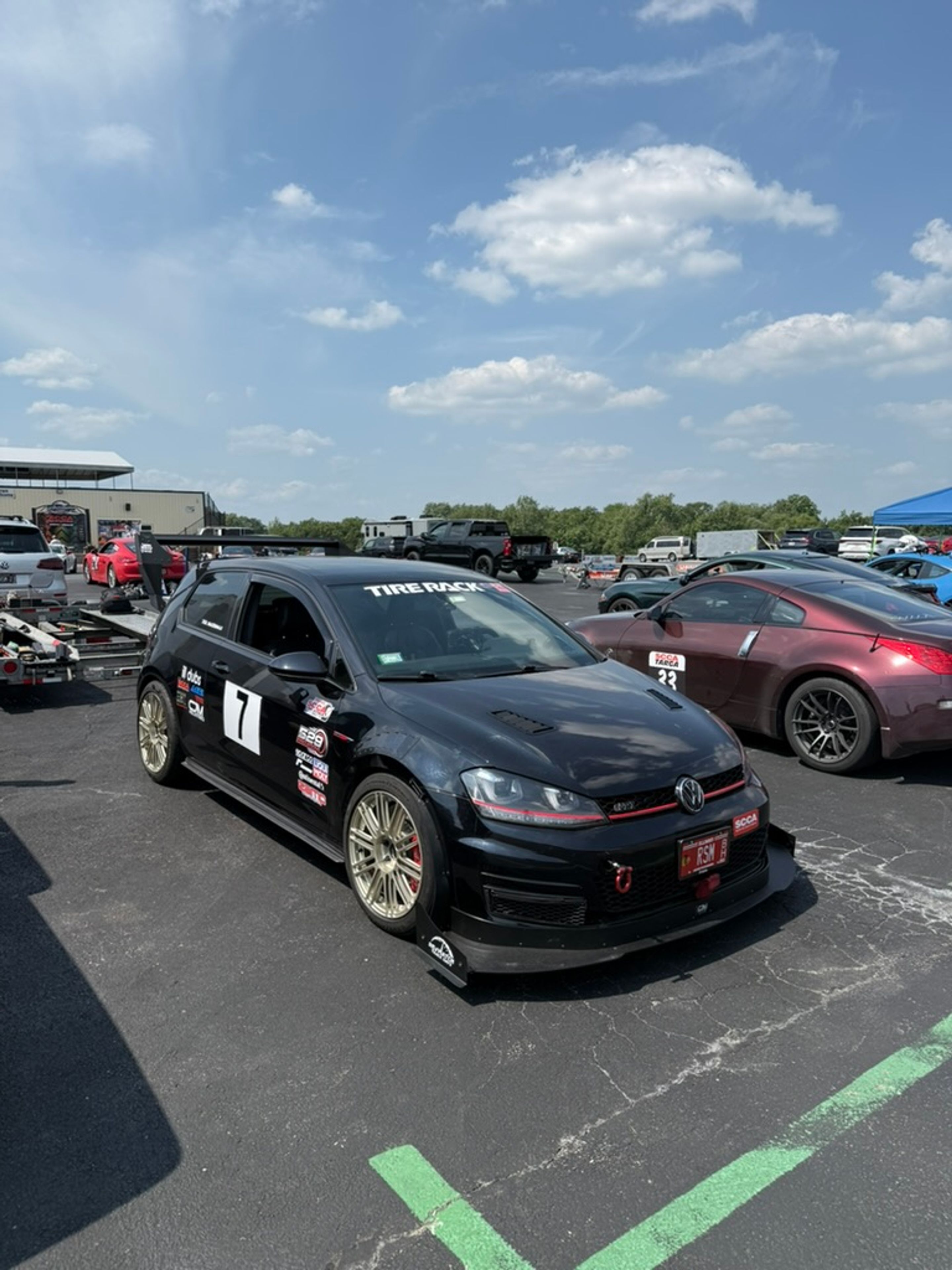 Black VW MK7 GTI with 18" TC-10RT Apex wheels in Motorsport Gold