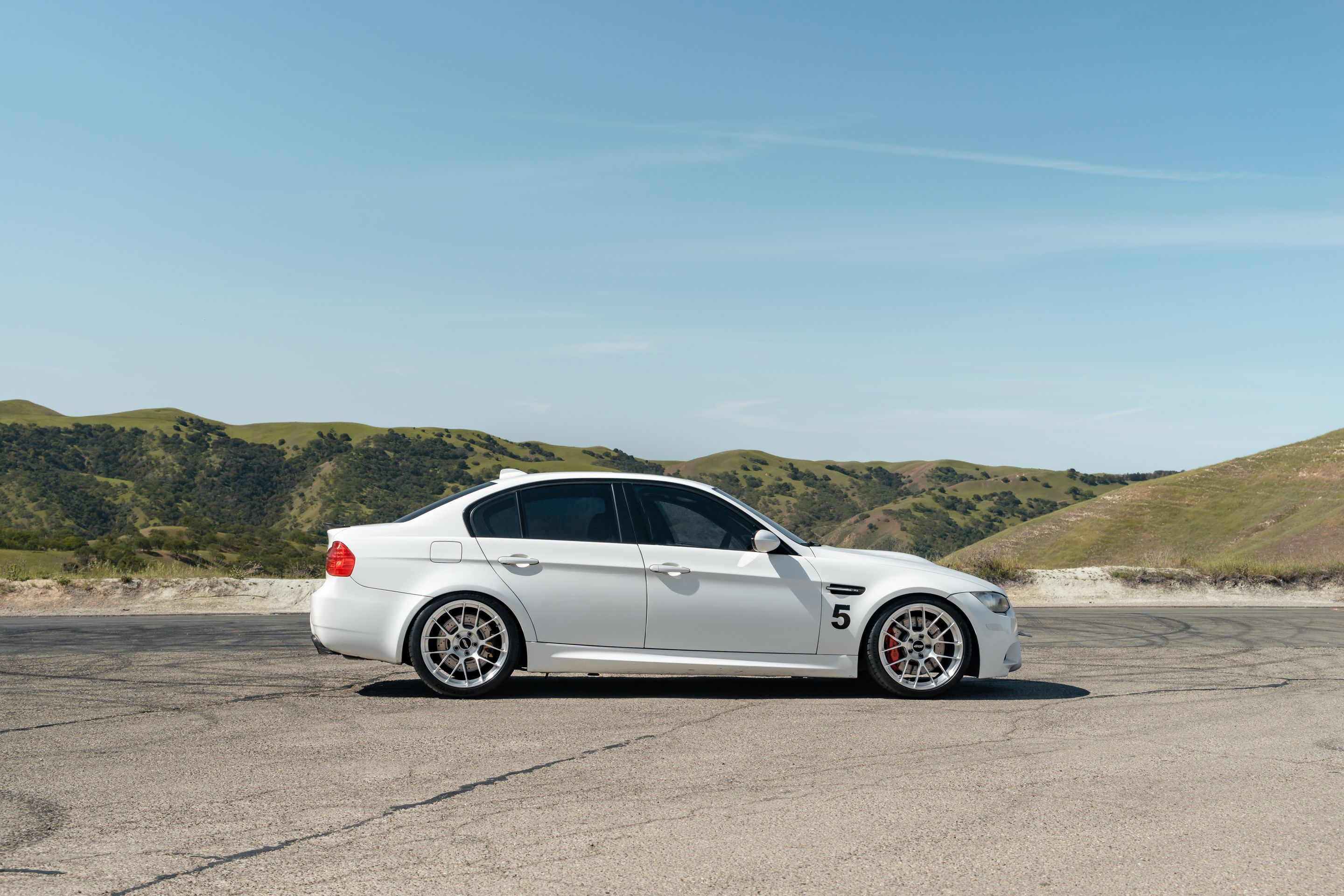 White BMW E90 Sedan M3 with 19" EC-7RS Apex wheels in Brushed Clear