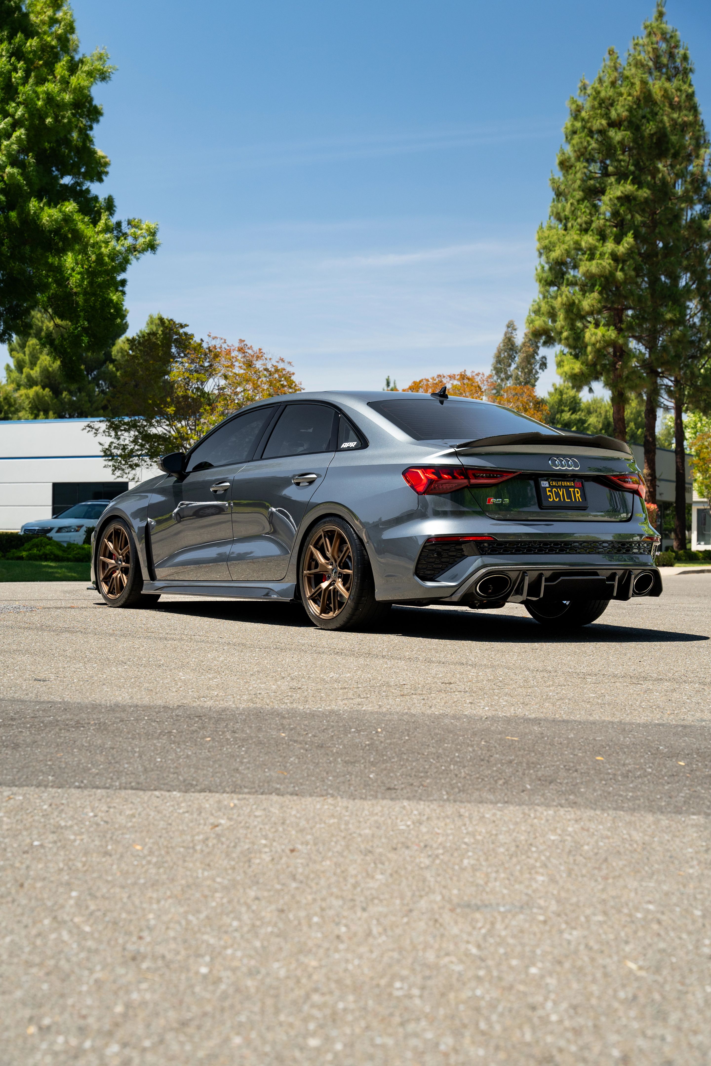 Grey Audi 8Y RS 3 with 18" VS-5 Apex wheels in Satin Bronze