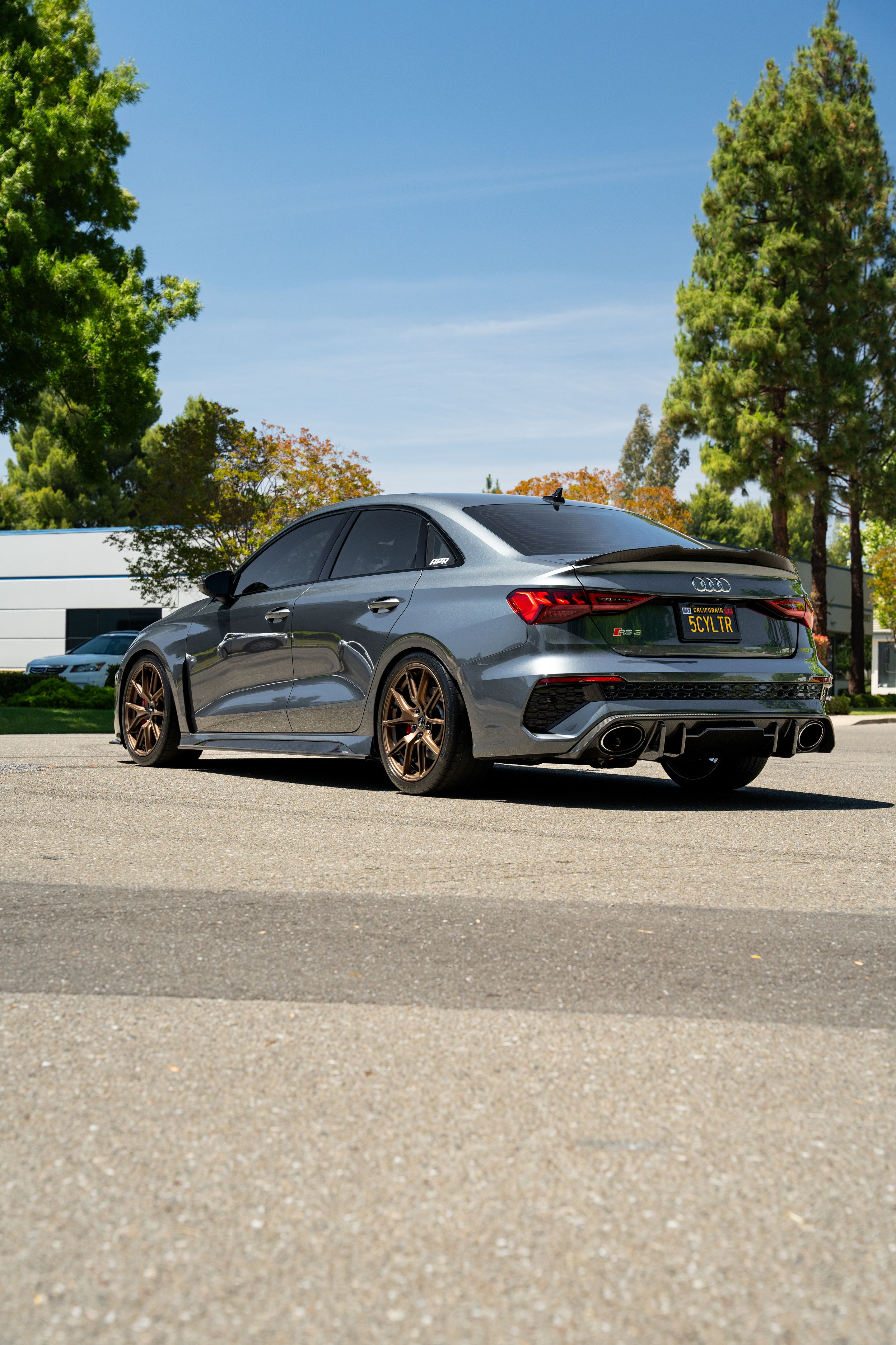 Grey Audi 8Y RS 3 with 18" VS-5 Apex wheels in Satin Bronze