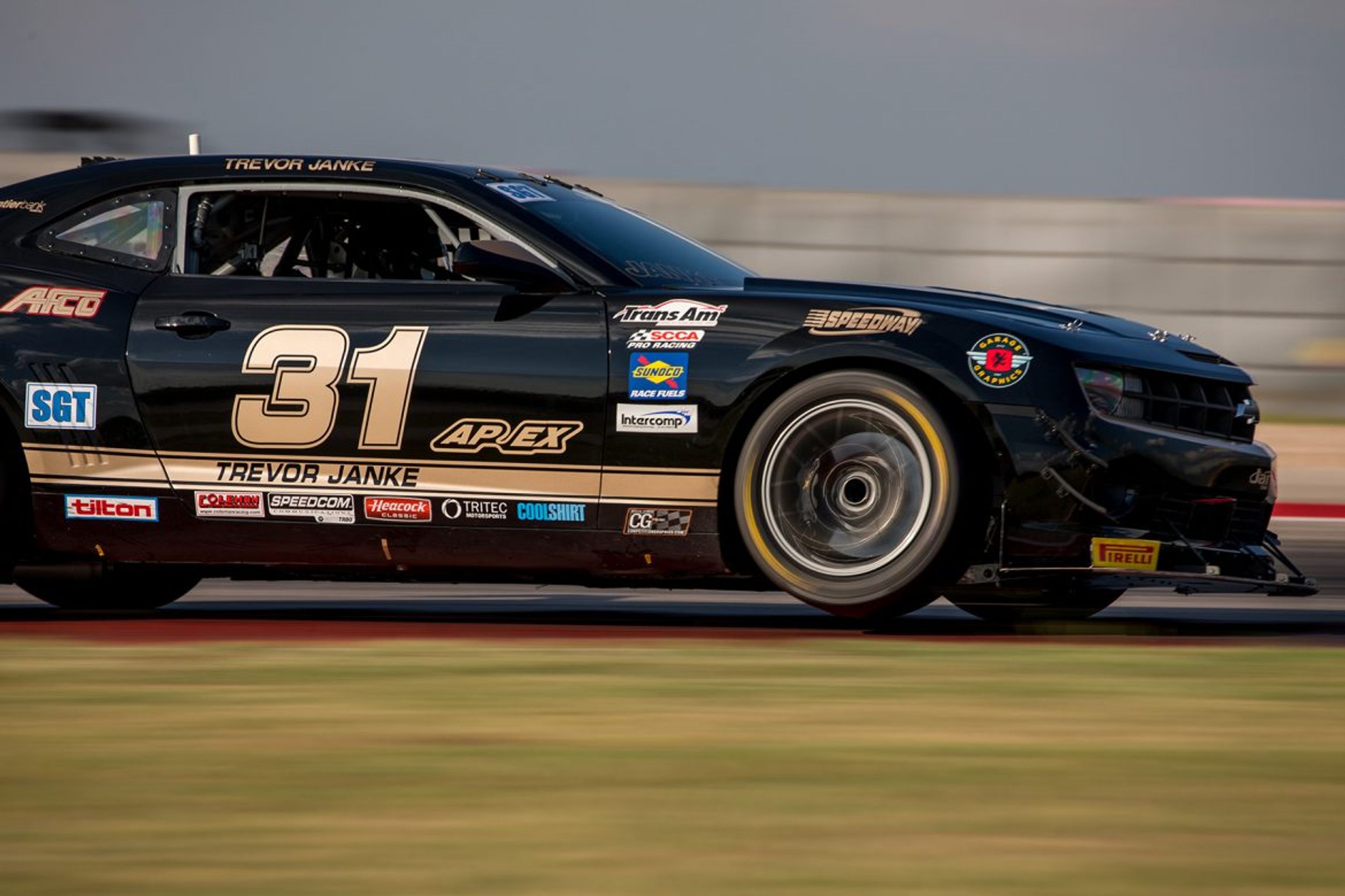 Black Chevrolet 5th Gen Camaro SS with 18" EC-7 Apex wheels in Anthracite