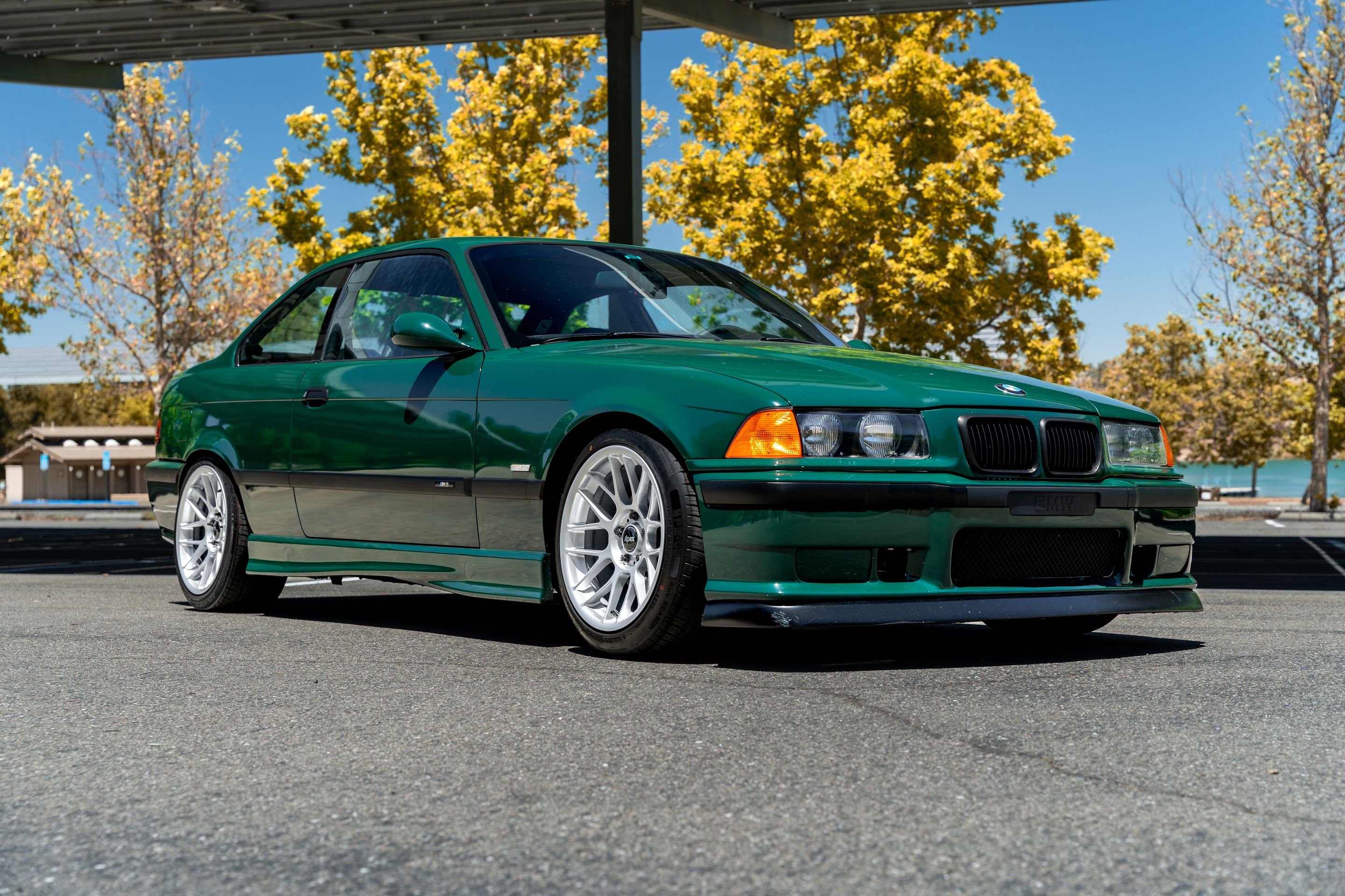 Green BMW E36 M3 with 17" ARC-8 Apex wheels in Race Silver