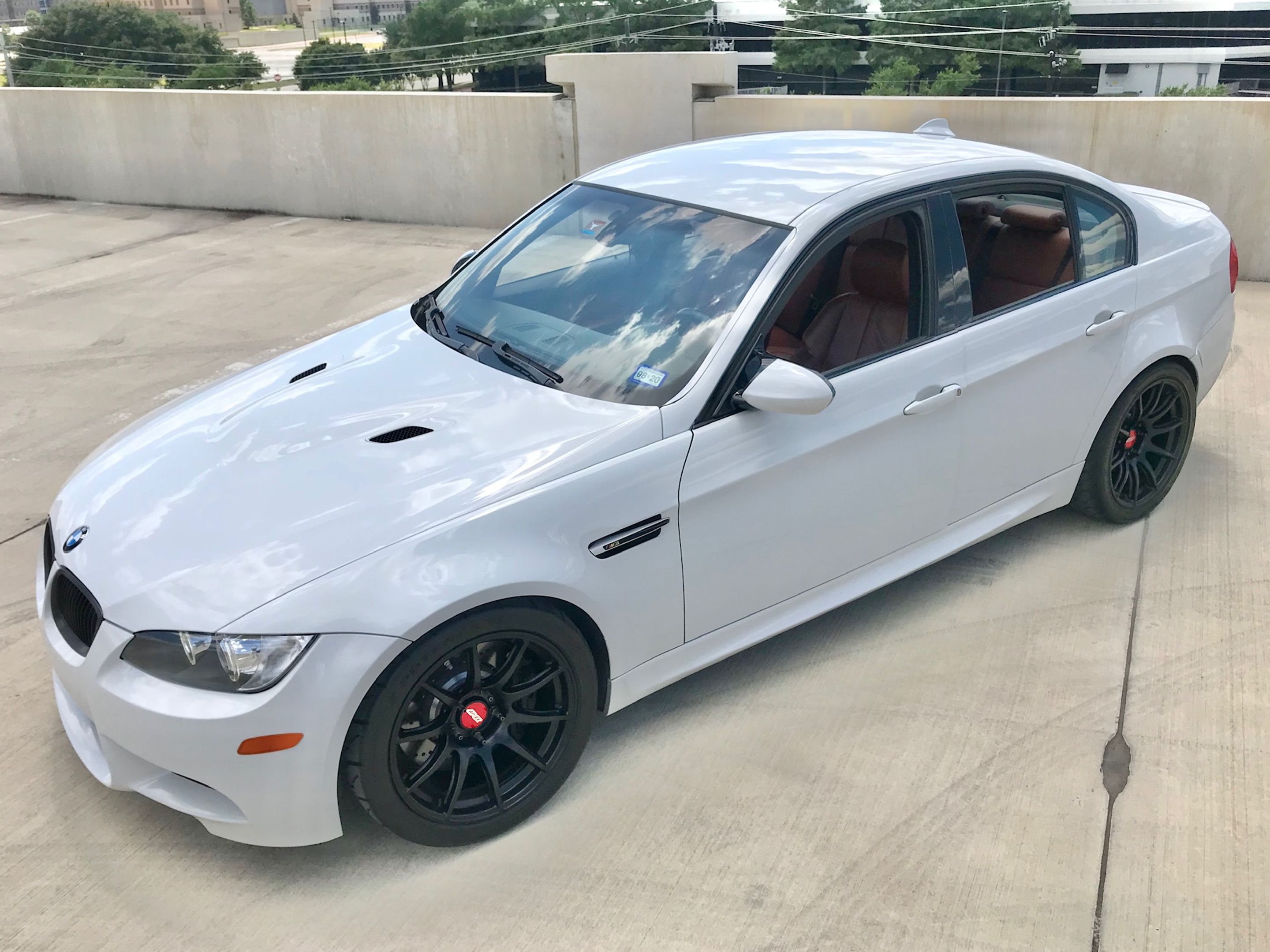 White BMW E90 Sedan M3 with 18" SM-10 Apex wheels in Satin Black
