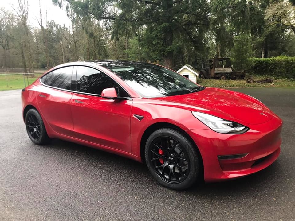 Red Tesla Model 3 with 18" EC-7 Apex wheels in Satin Black