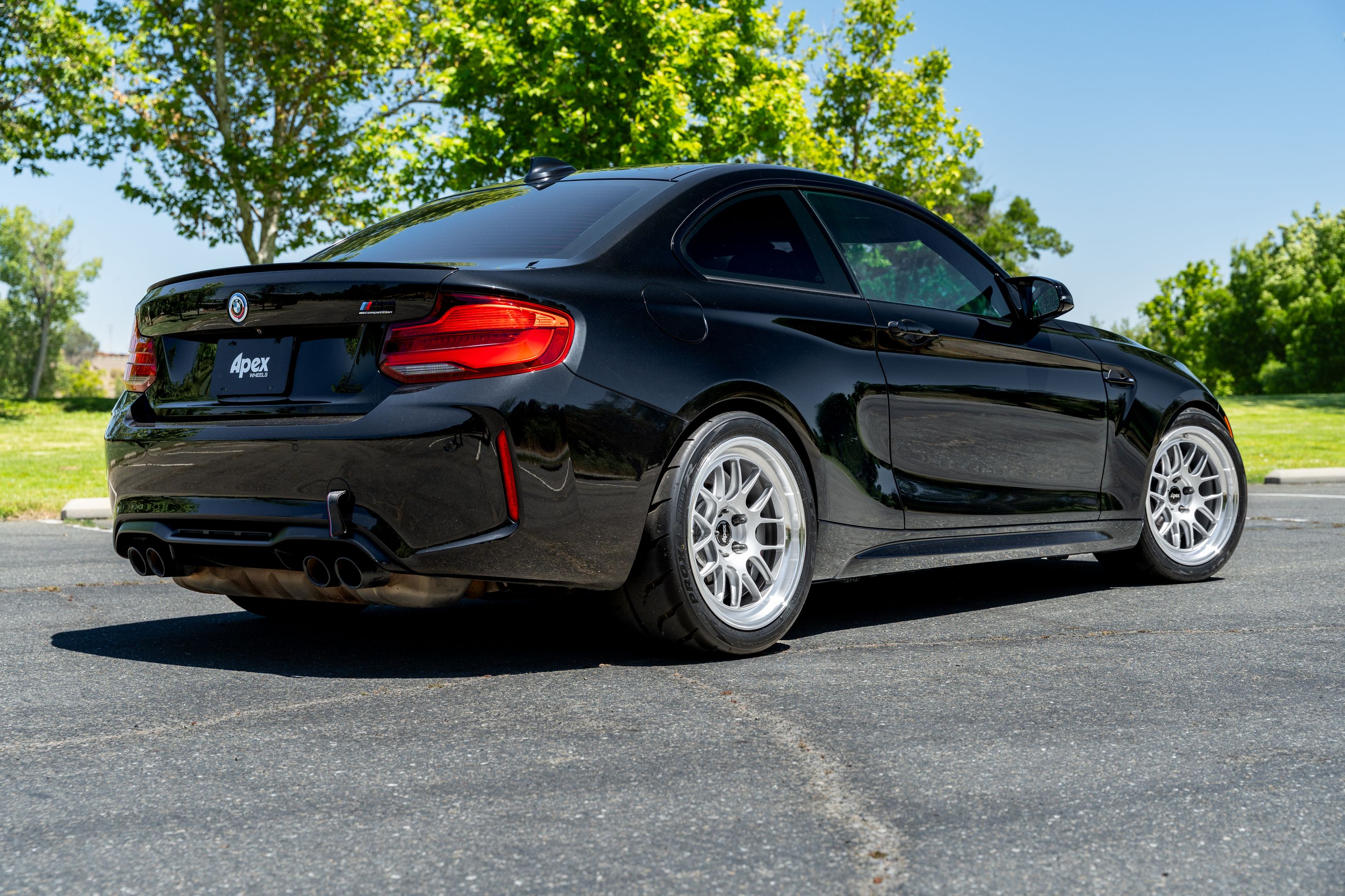 Black BMW F87 M2 with 18" ML-7RT Apex wheels in Machined Lip Race Silver