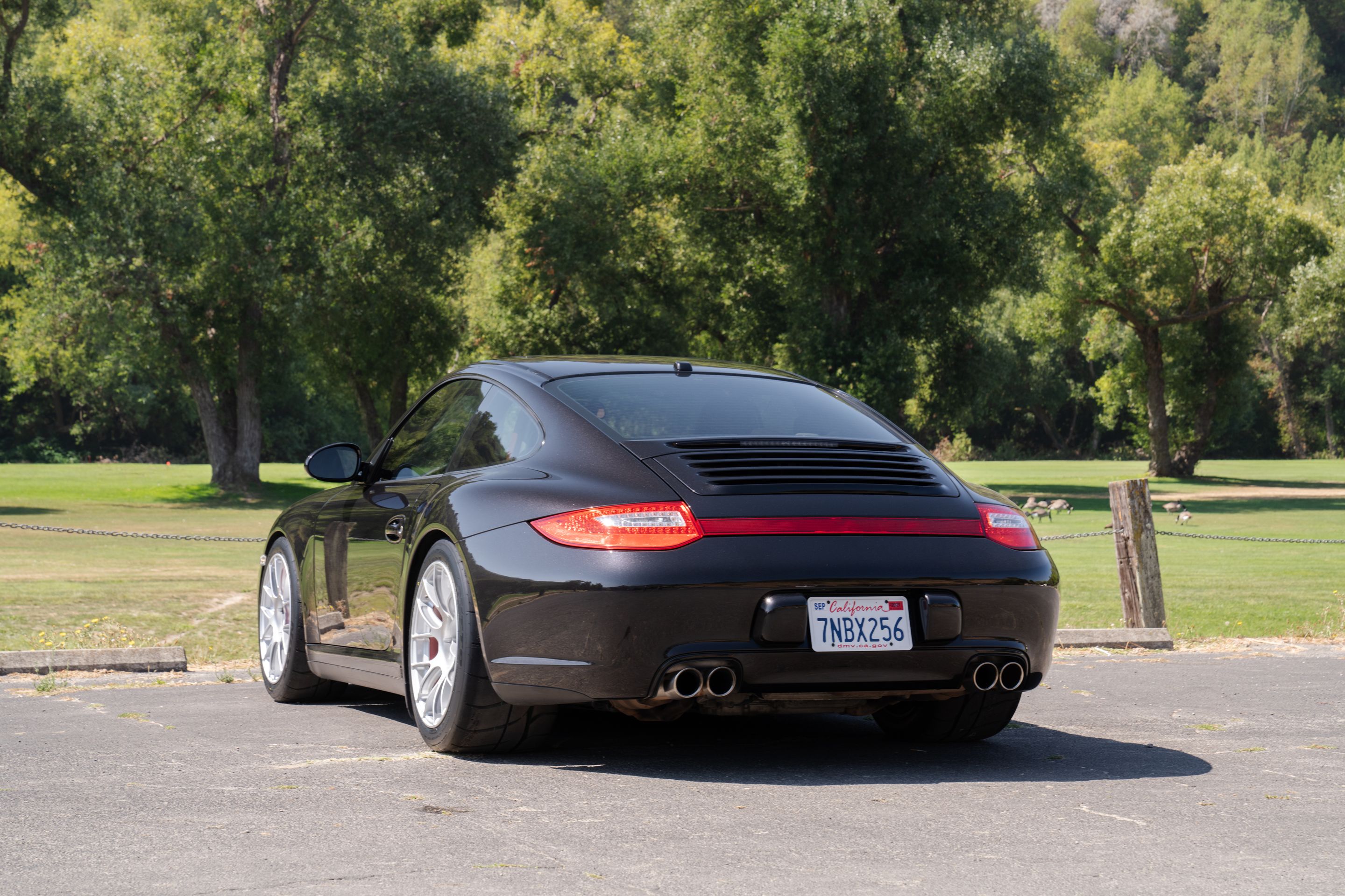 Black Porsche 911 997 Carrera 4S with 18" EC-7RS Apex wheels in Race Silver