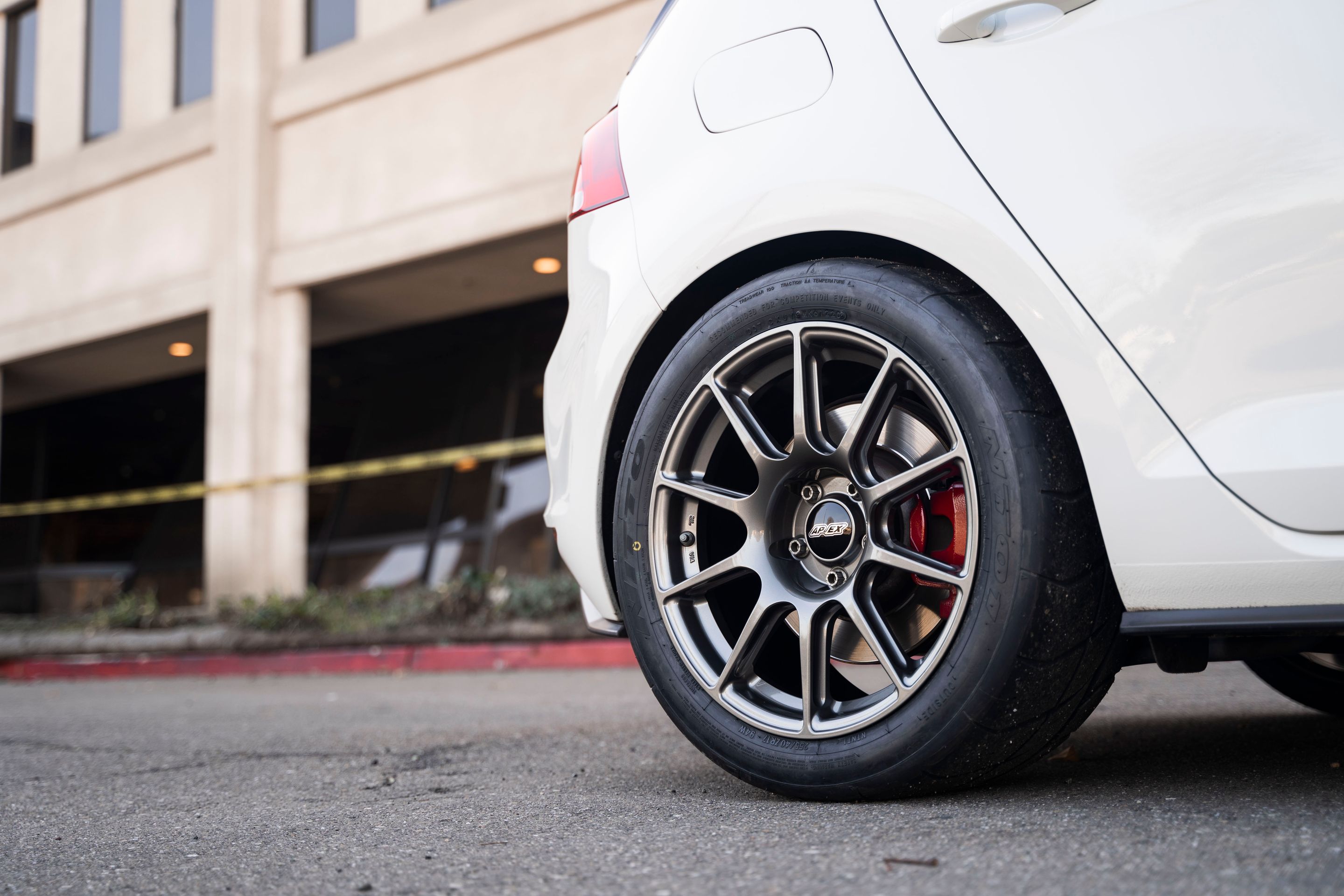 White VW MK7 GTI with 17" SM-10 Apex wheels in Anthracite