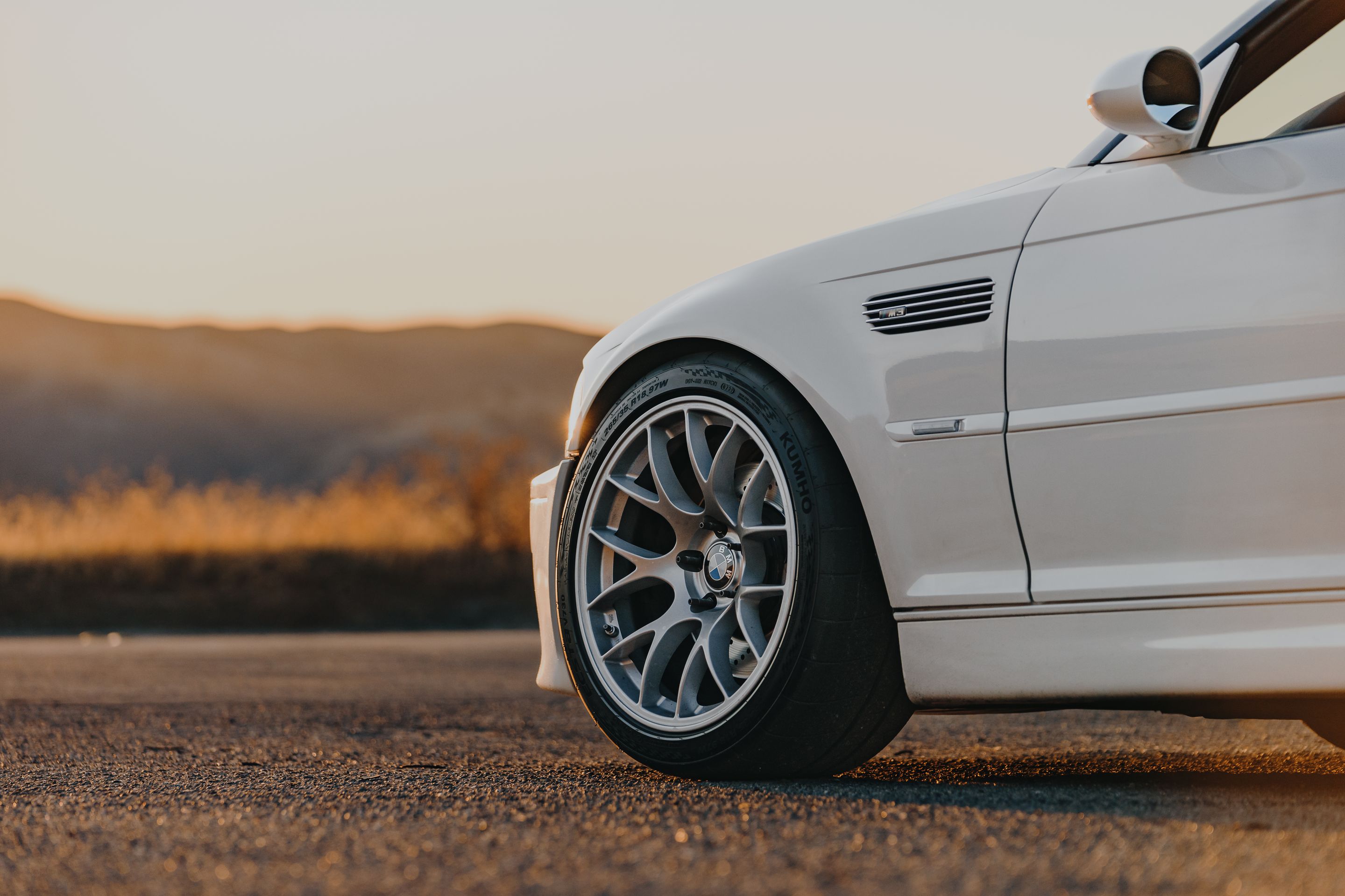 White BMW E46 M3 with 18" EC-7 Apex wheels in Race Silver
