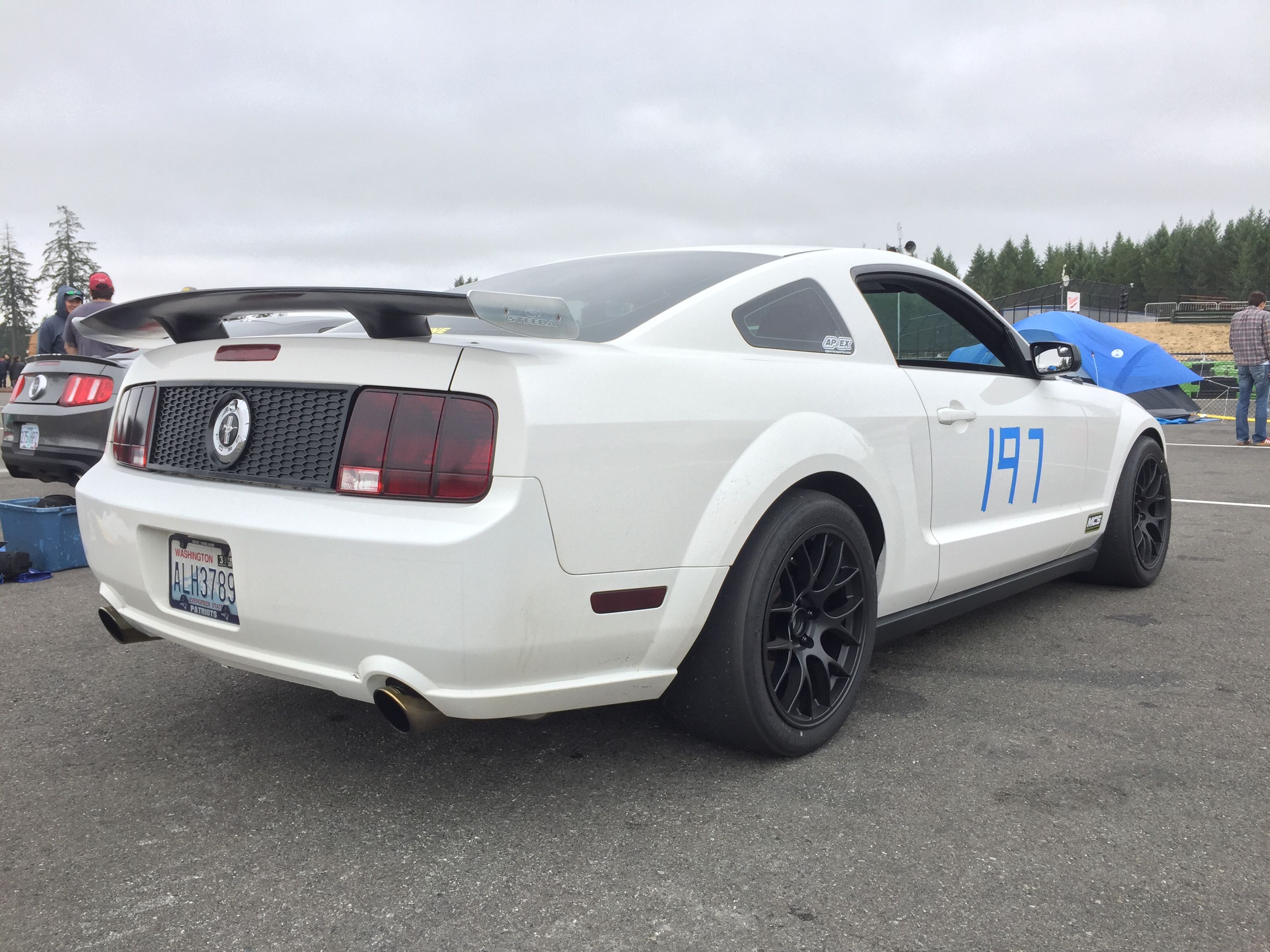White Ford S197 Mustang GT with 18" EC-7 Apex wheels in Satin Black