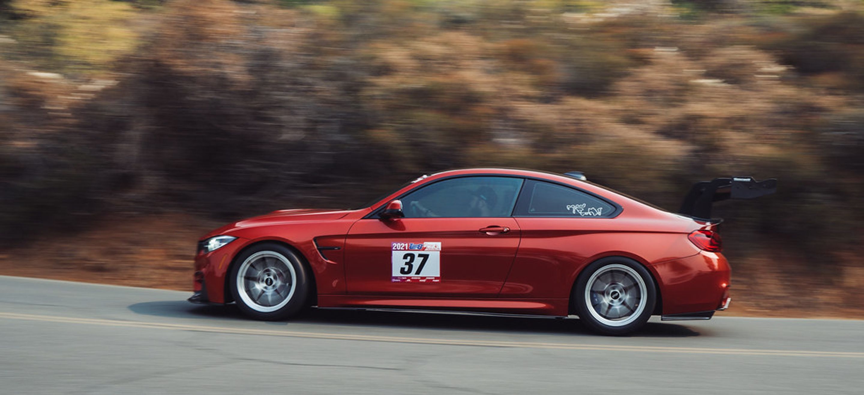 Orange BMW F82 Coupe M4 with 18" VS-5RS Apex wheels in Brushed Clear