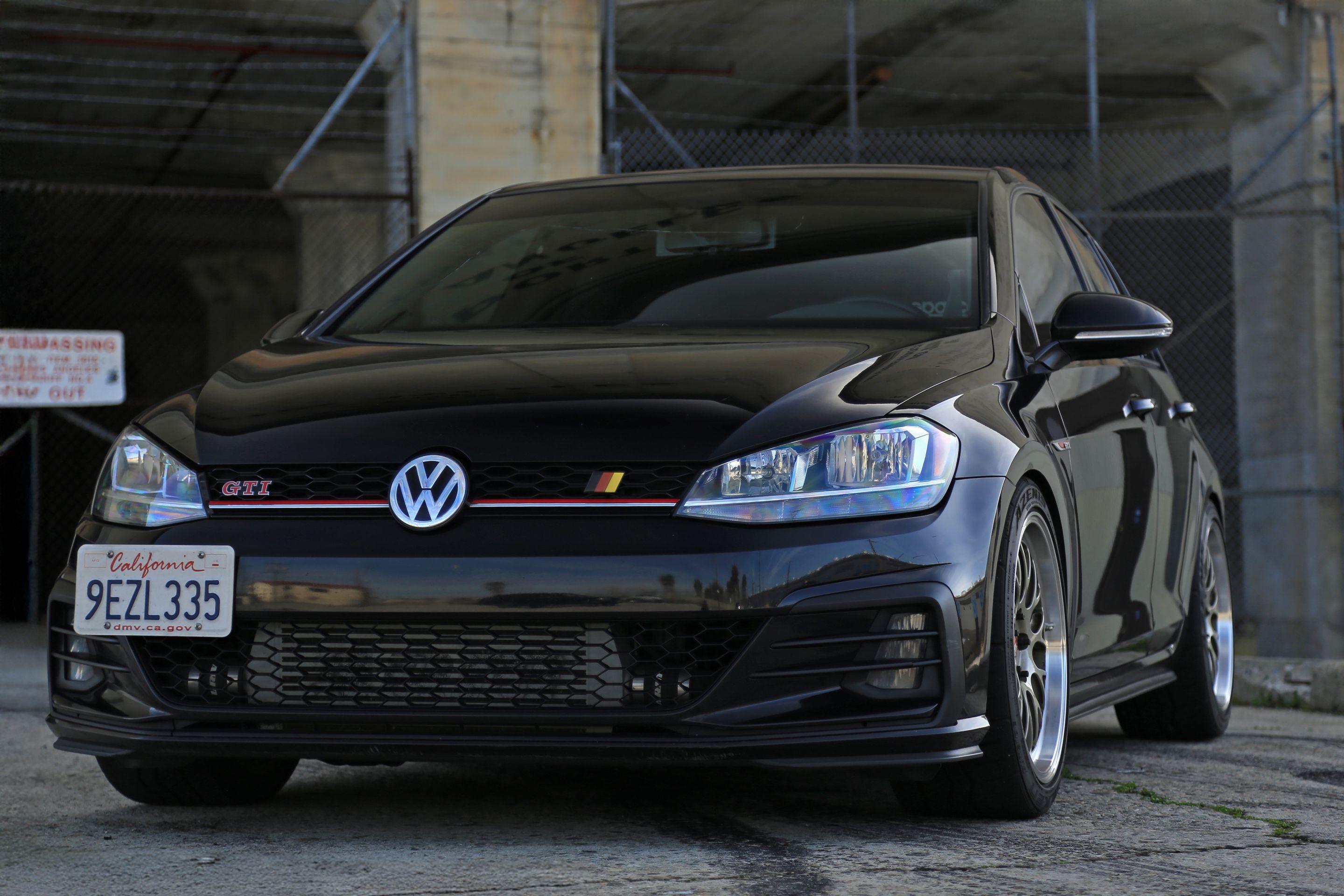 Black VW MK7 GTI with 18" ML-10RT Apex wheels in Machined Lip Gloss Motorsport Gold