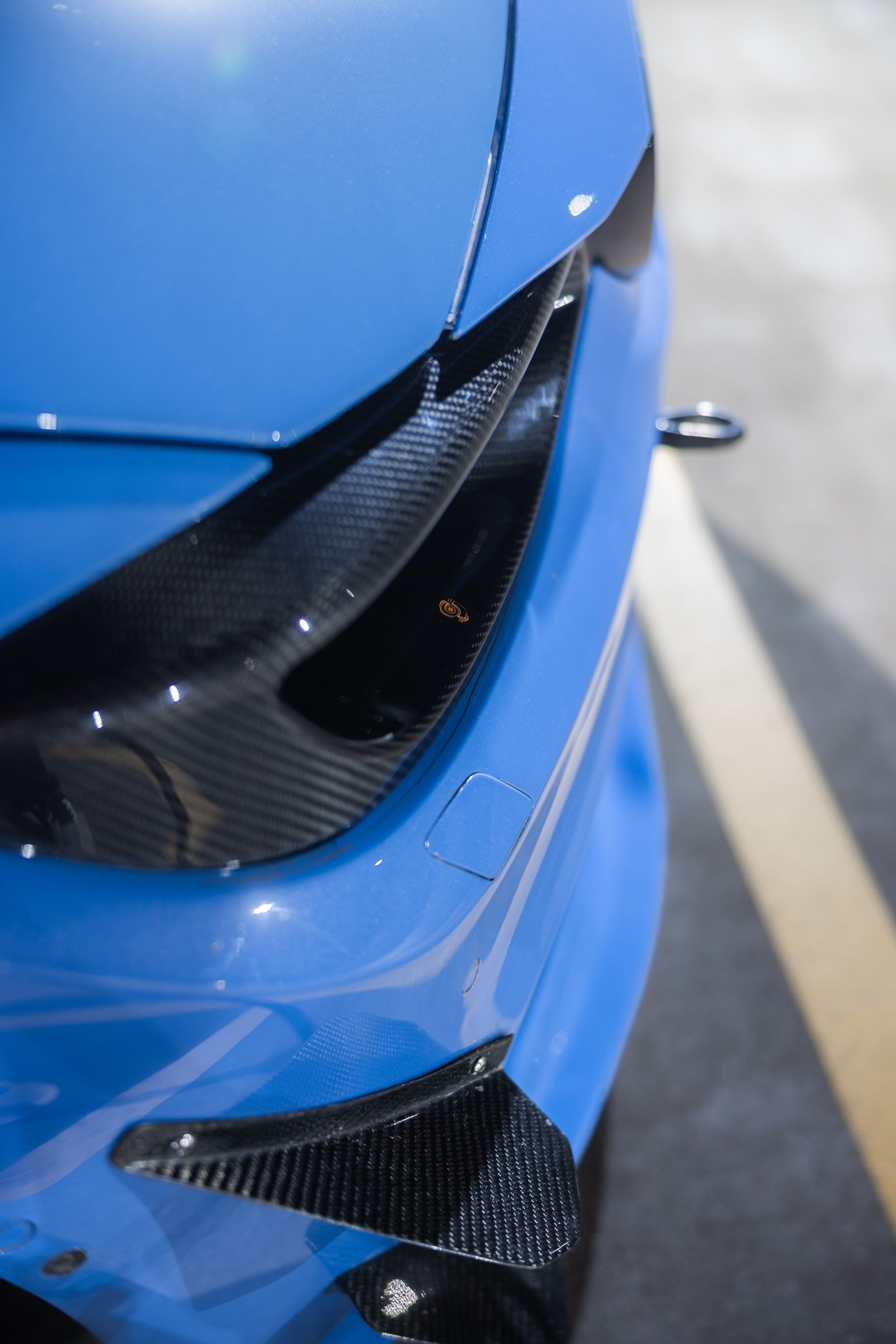 Blue BMW F82 Coupe M4 with 18" ARC-8 Apex wheels in Race Silver