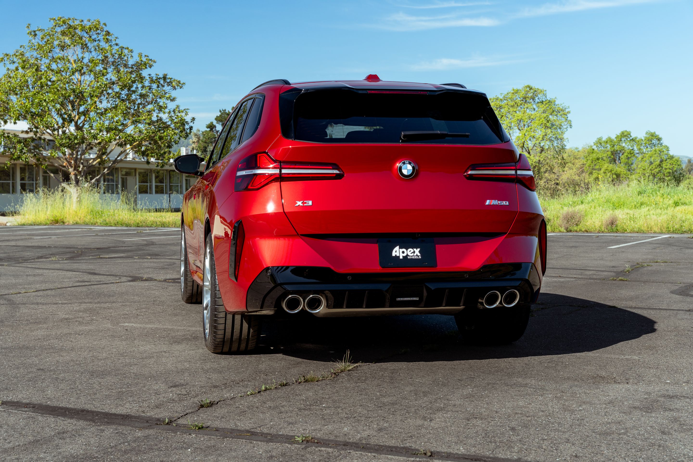 Red BMW G45 X3 with 21" VS-5RX Apex wheels in Brushed Clear