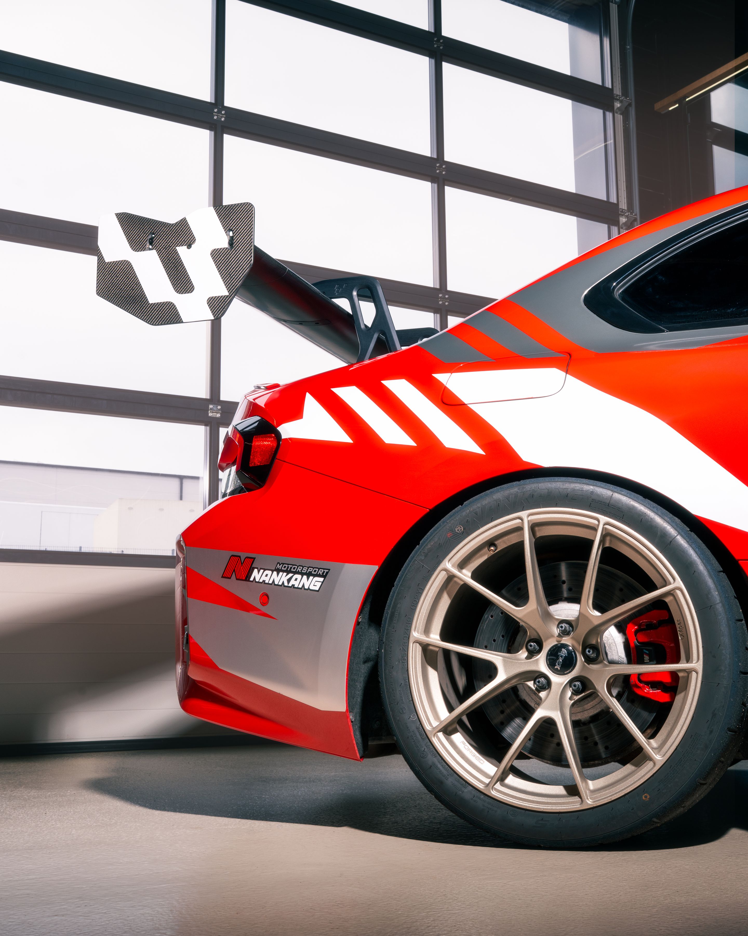 Red BMW G87 M2 with 19" VS-5RS Apex wheels in Motorsport Gold