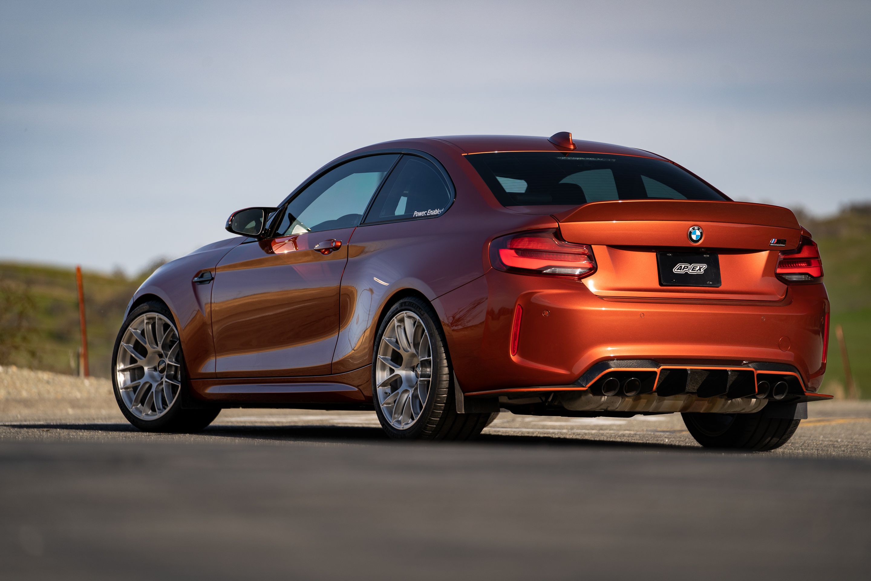 Orange BMW F87 M2 with 19" EC-7RS Apex wheels in Brushed Clear