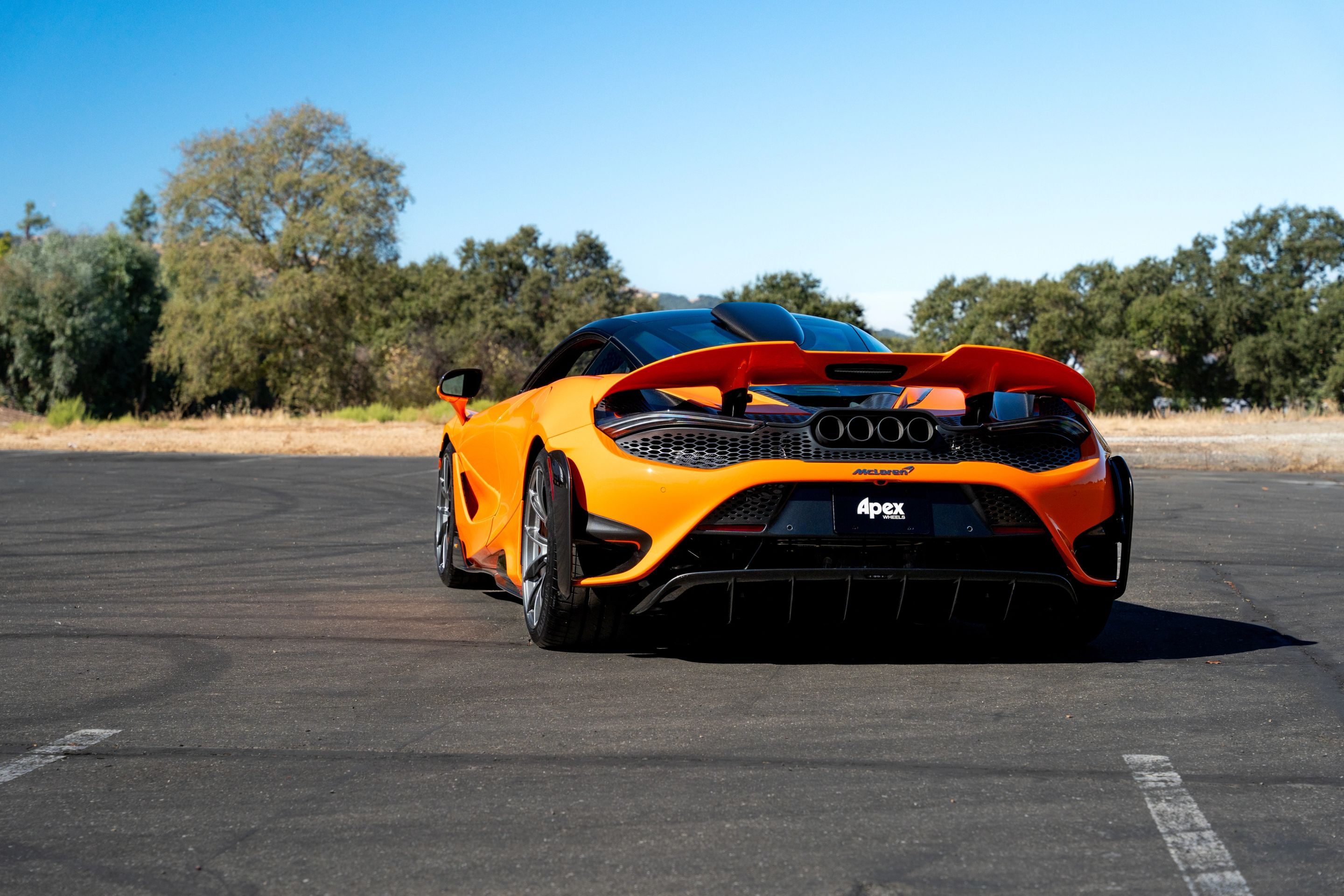Orange McLaren 765LT with 19"/20" VS-5RS Apex wheels in Anthracite