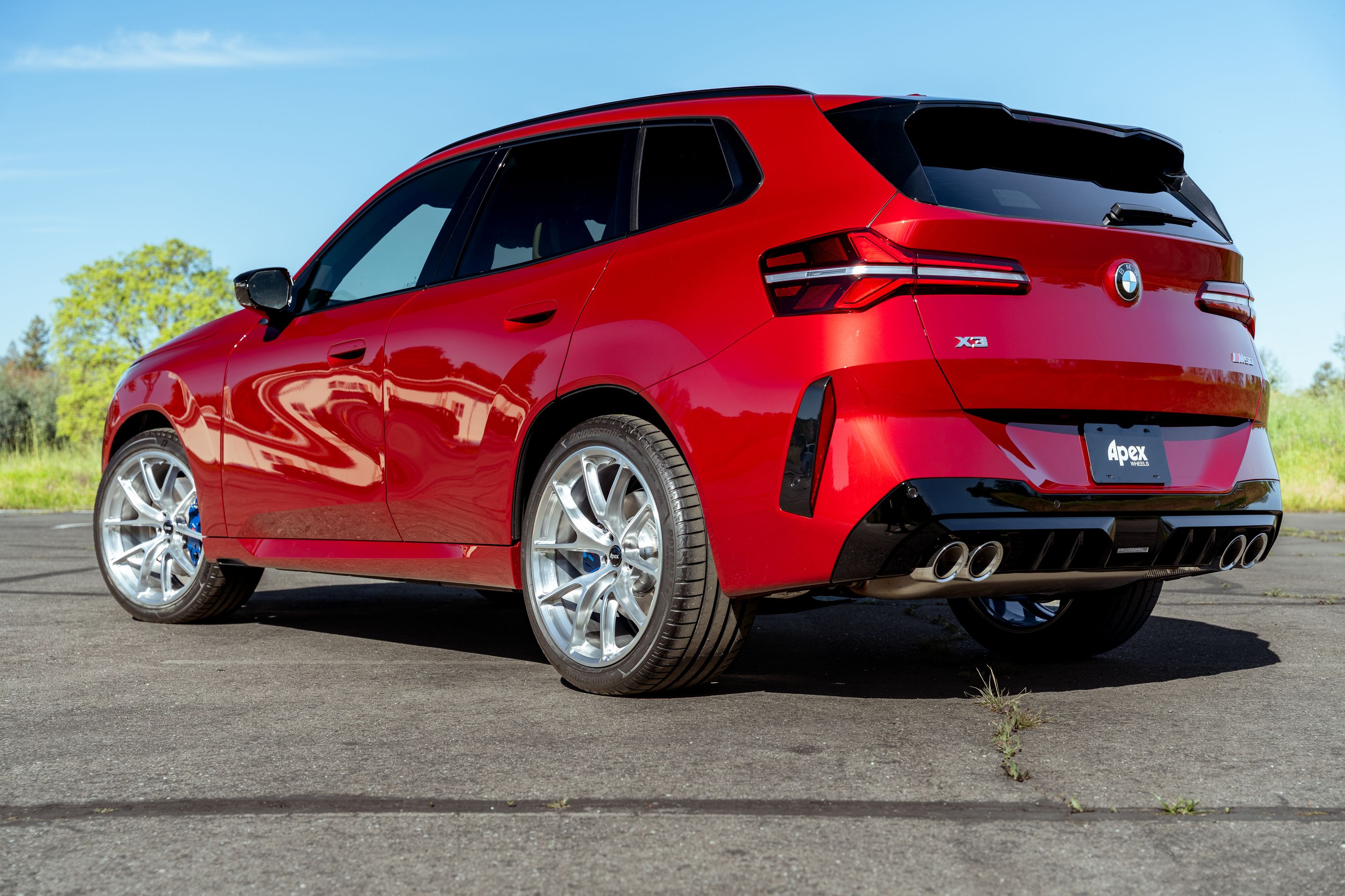 Red BMW G45 X3 with 21" VS-5RX Apex wheels in Brushed Clear