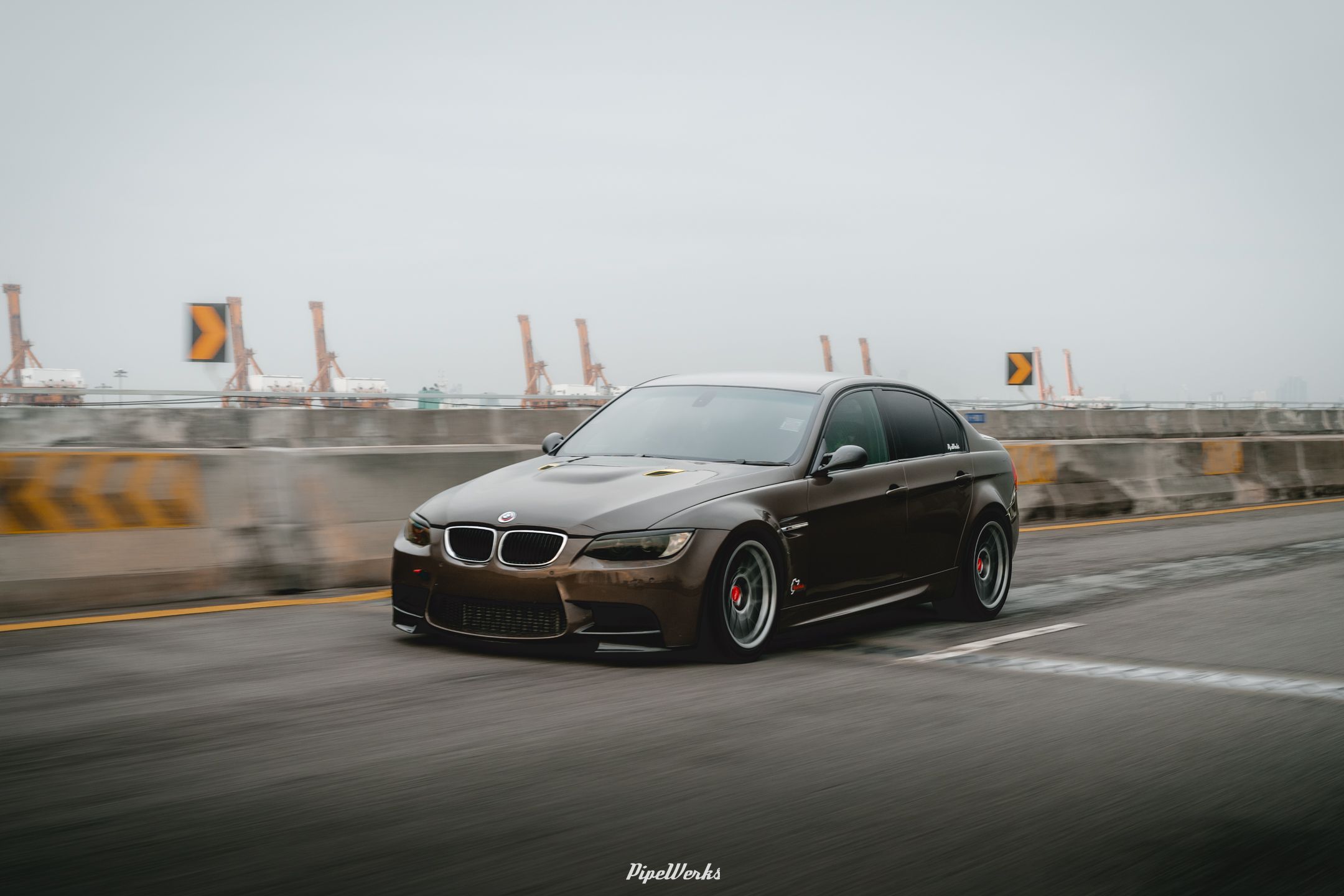 Brown BMW E90 Sedan 3 Series with 18" ARC-8 Apex wheels in Hyper Black