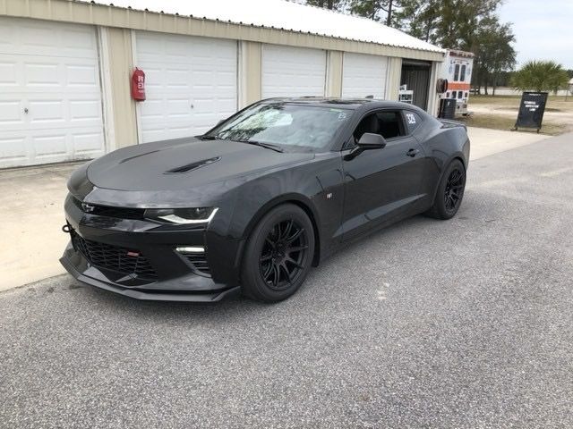 Black Chevrolet 6th Gen Camaro SS 1LE with 18" SM-10 Apex wheels in Satin Black
