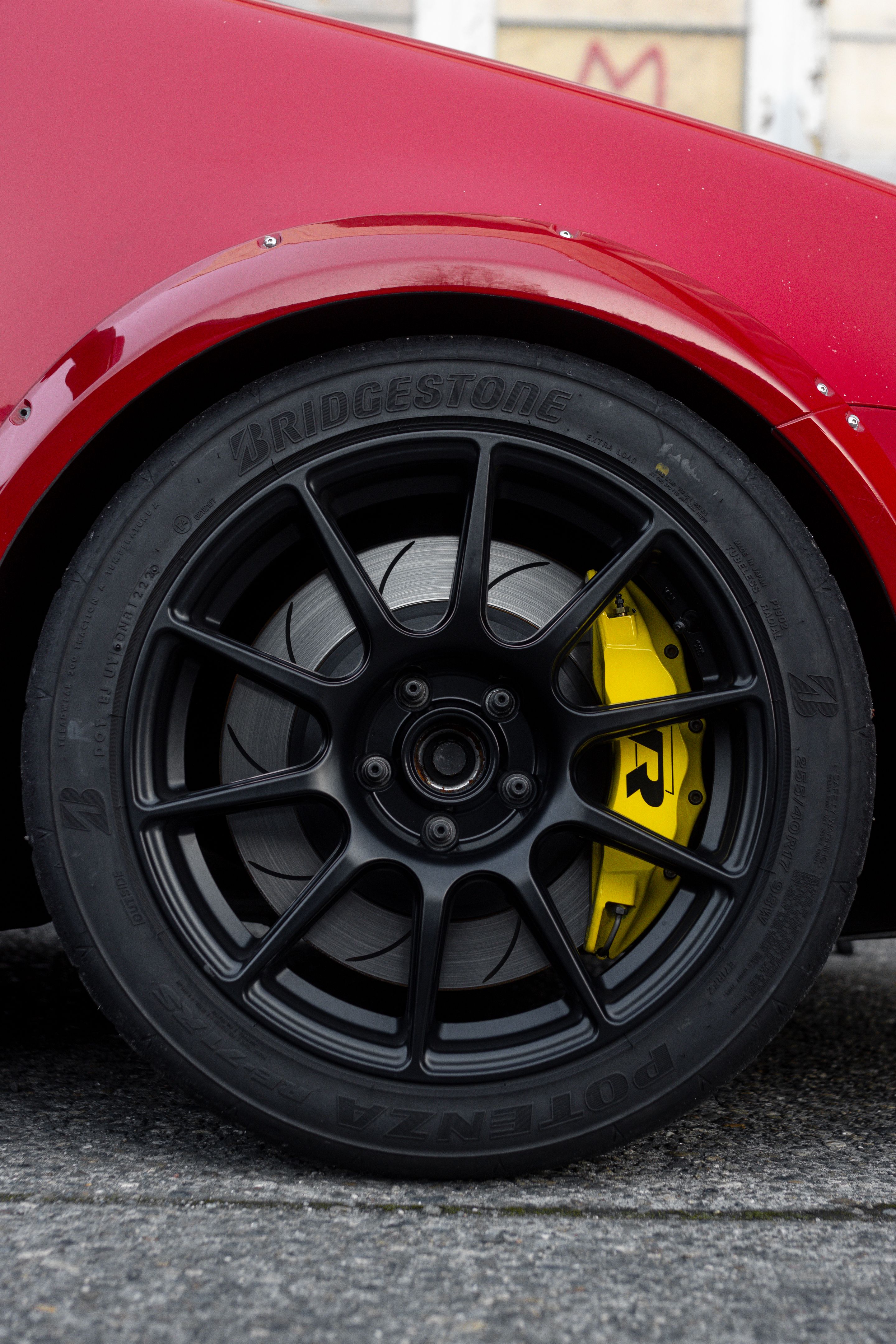 Red VW MK5 Golf with 17" SM-10 Apex wheels in Satin Black