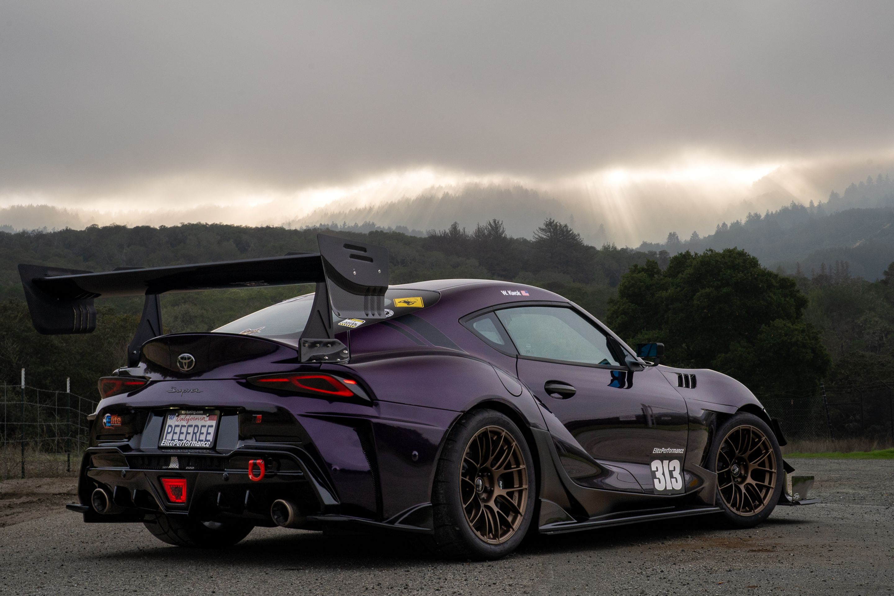 Purple Toyota GR Supra with 18" EC-7RS Apex wheels in Satin Bronze