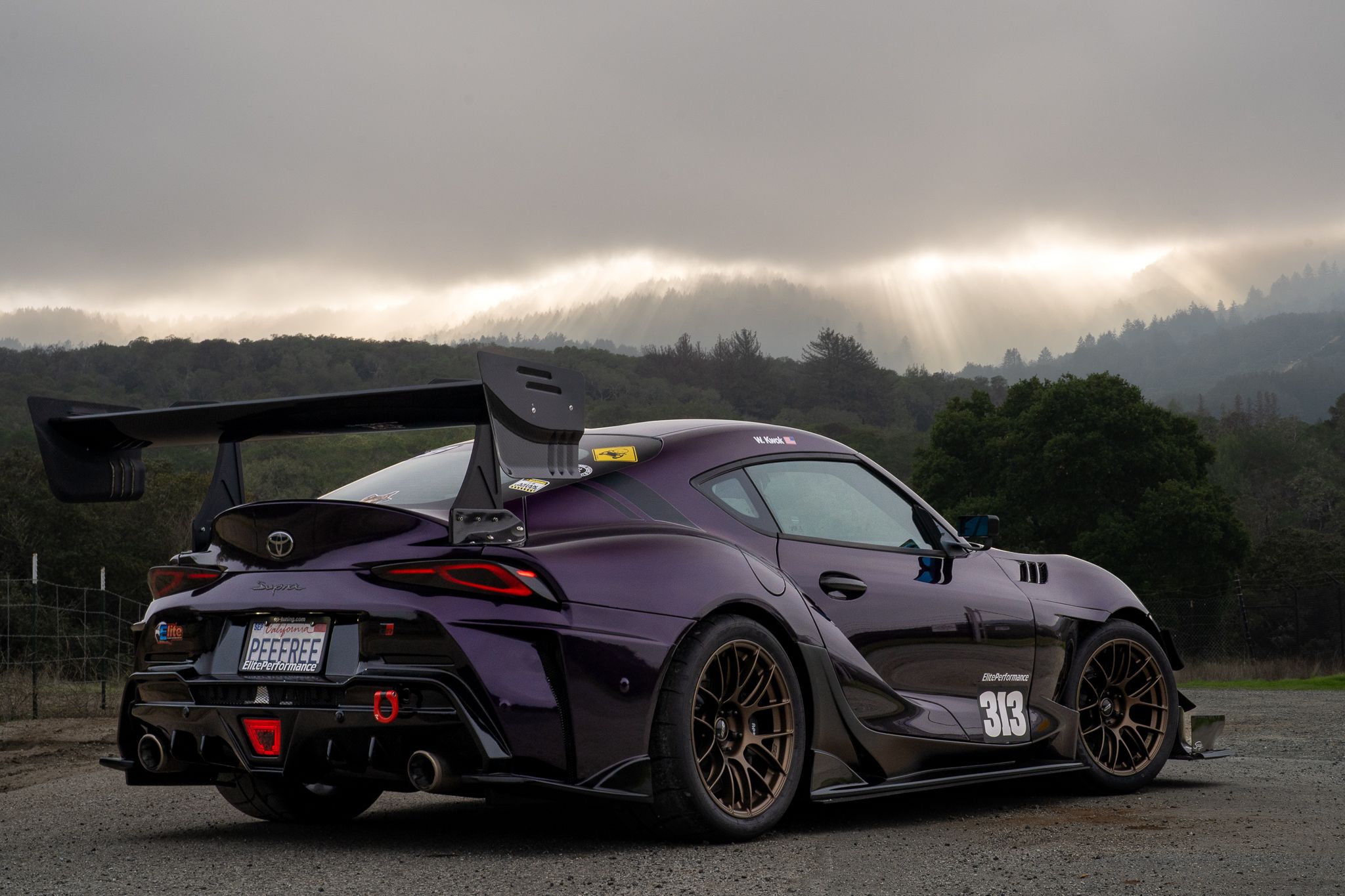 Purple Toyota GR Supra with 18" EC-7RS Apex wheels in Satin Bronze