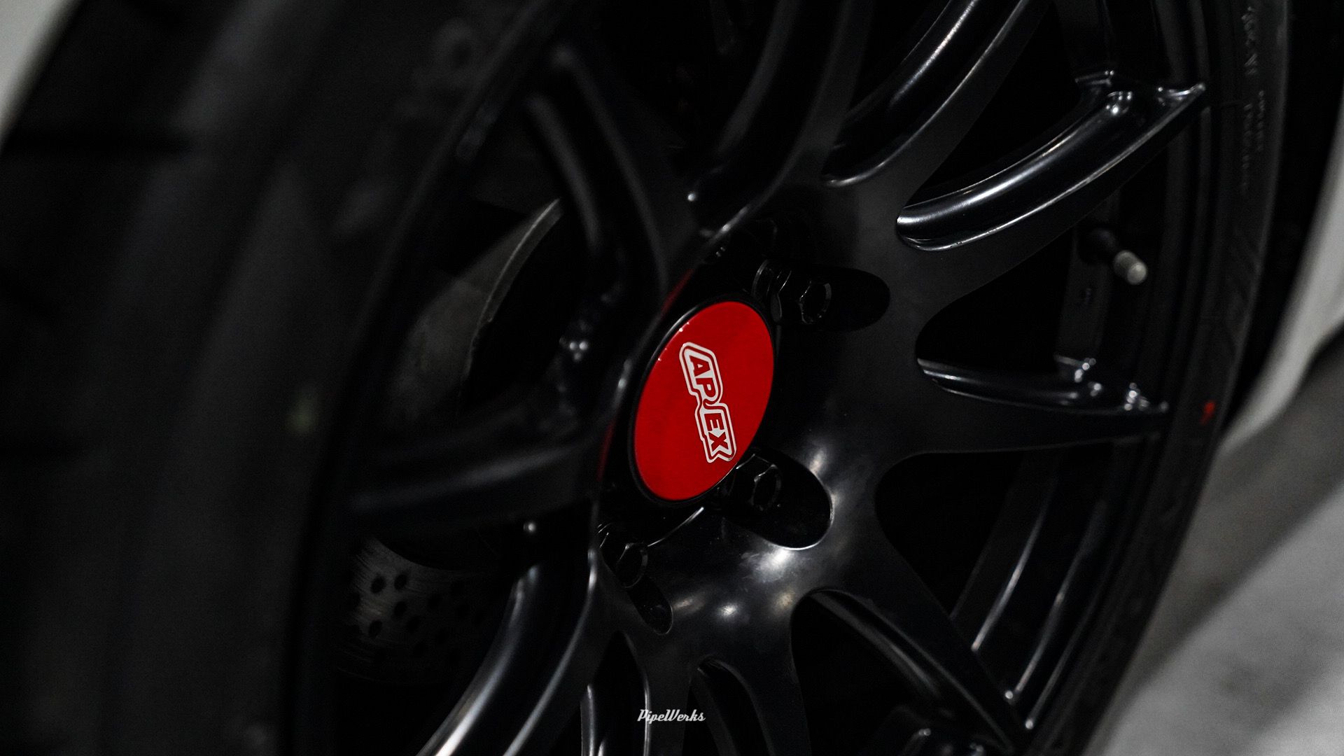 White Porsche 718 Cayman Base with 18" SM-10 Apex wheels in Satin Black