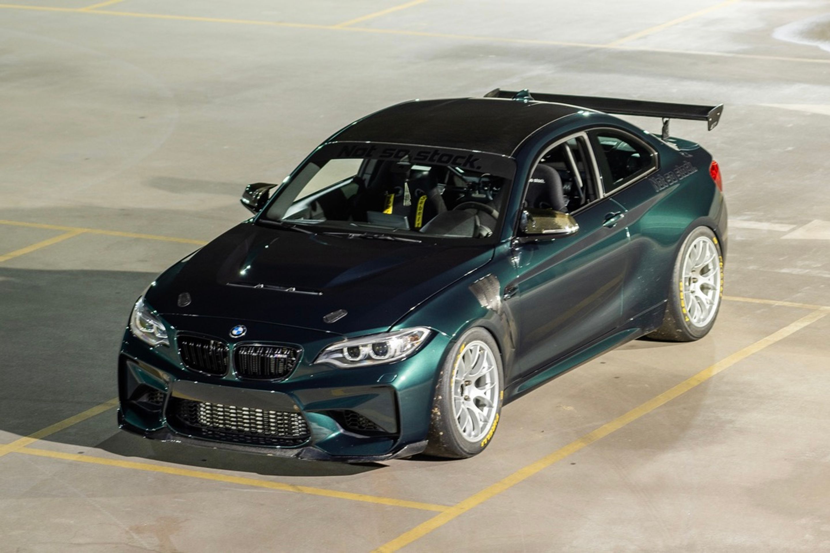 Green BMW F87 M2 with 18" EC-7 Apex wheels in Race Silver