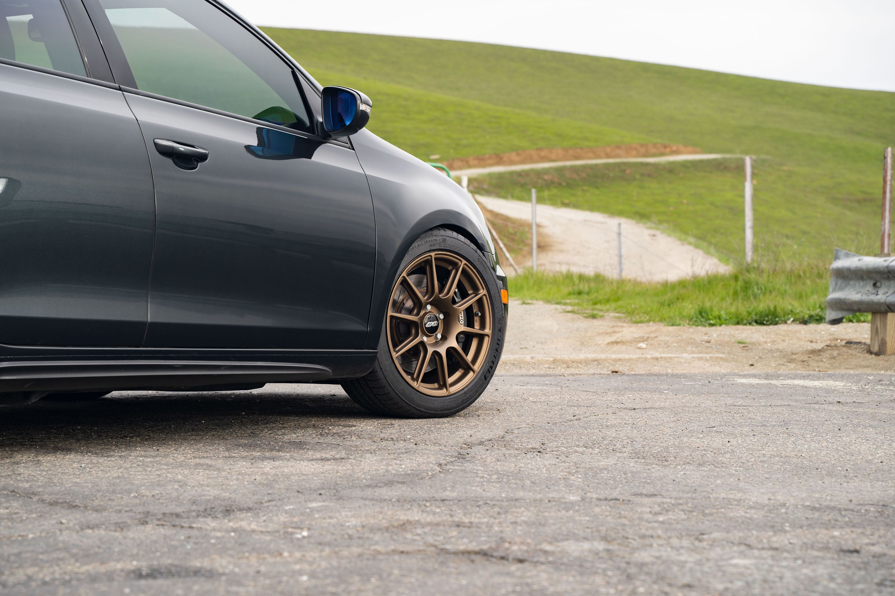 Grey VW MK6 GTI with 17" SM-10 Apex wheels in Satin Bronze