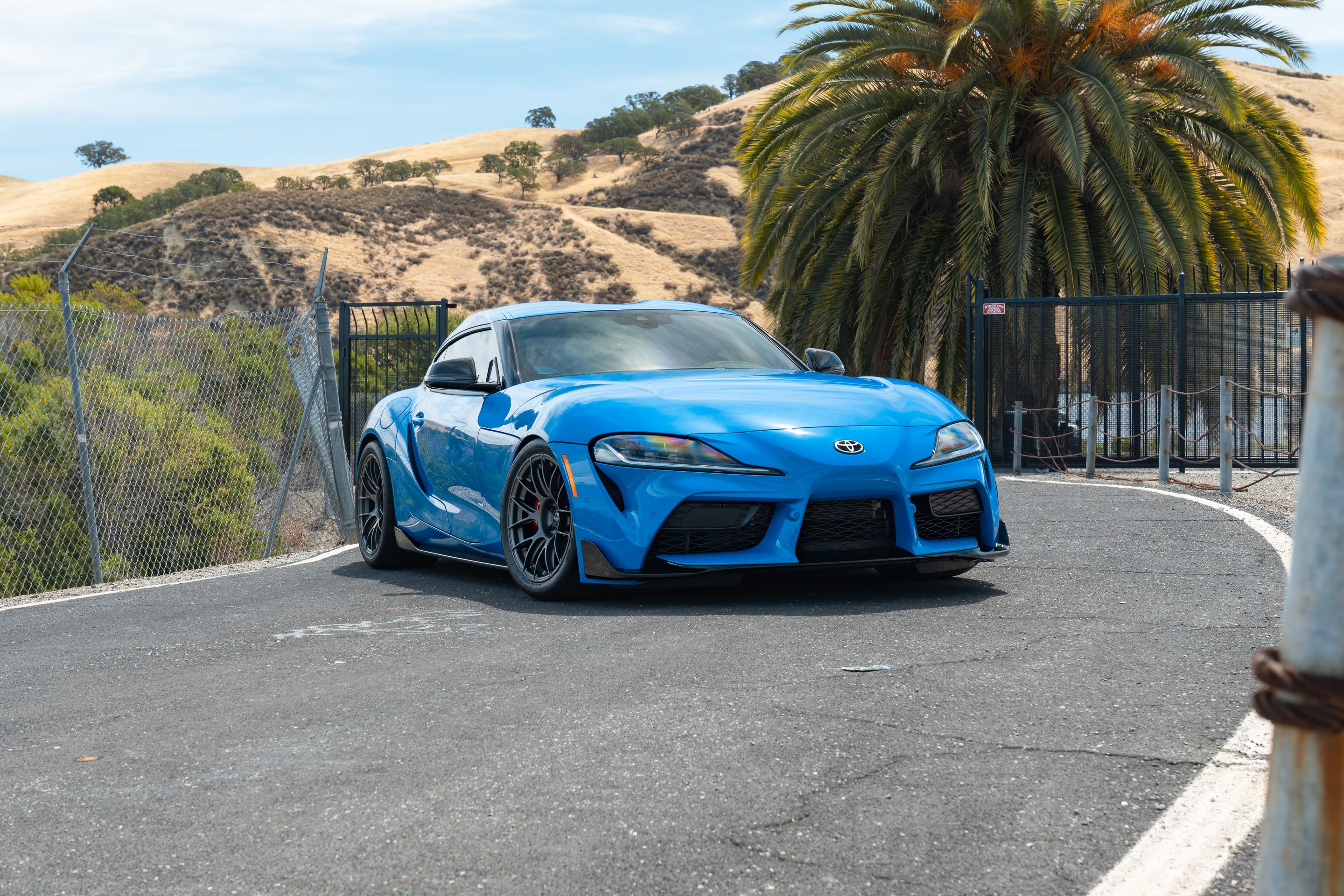 Blue Toyota GR Supra with 18" EC-7RS Apex wheels in Anthracite