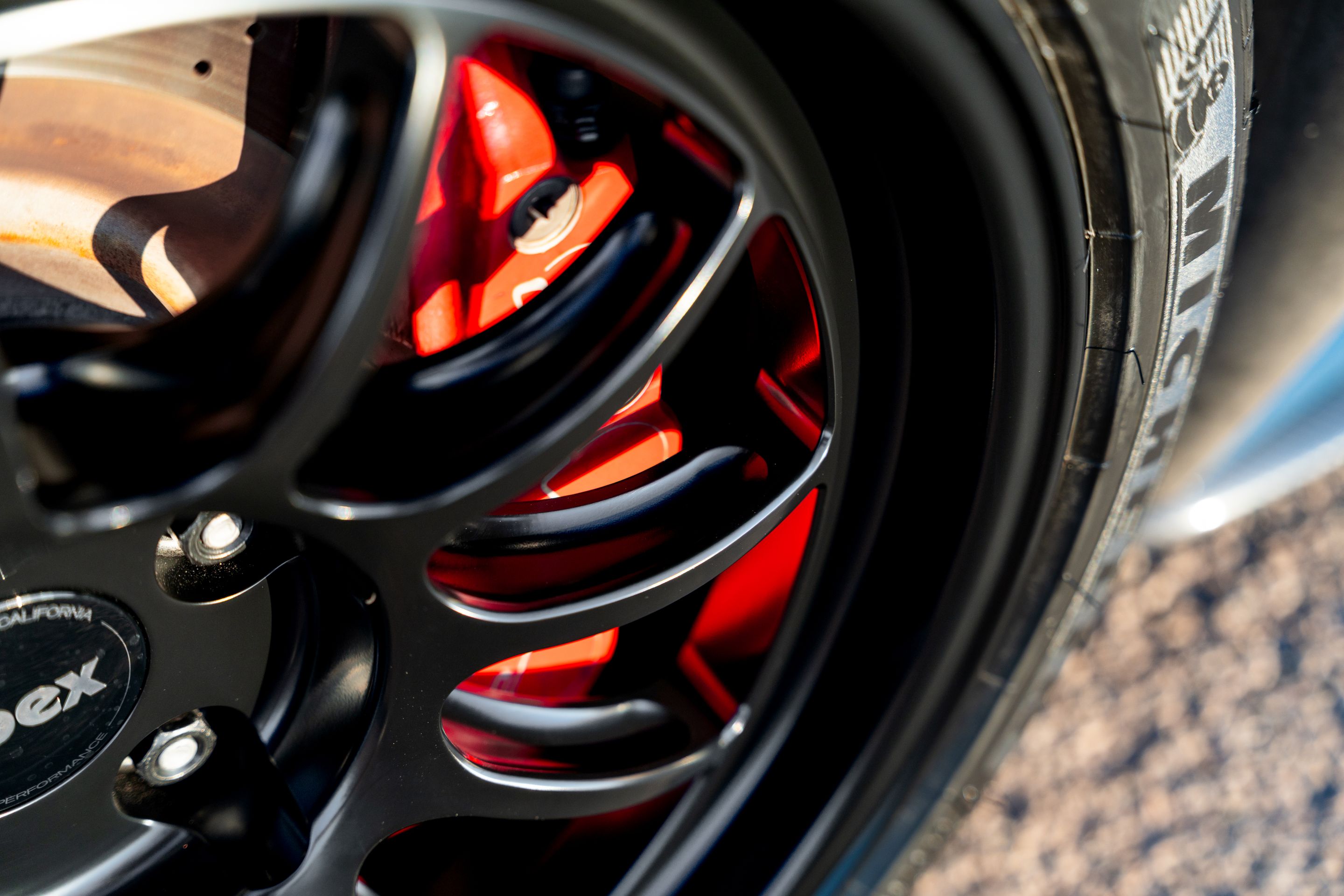 Blue Chevrolet C6 Corvette Z06 with 18"/19" TEST-S Apex wheels in Satin Black